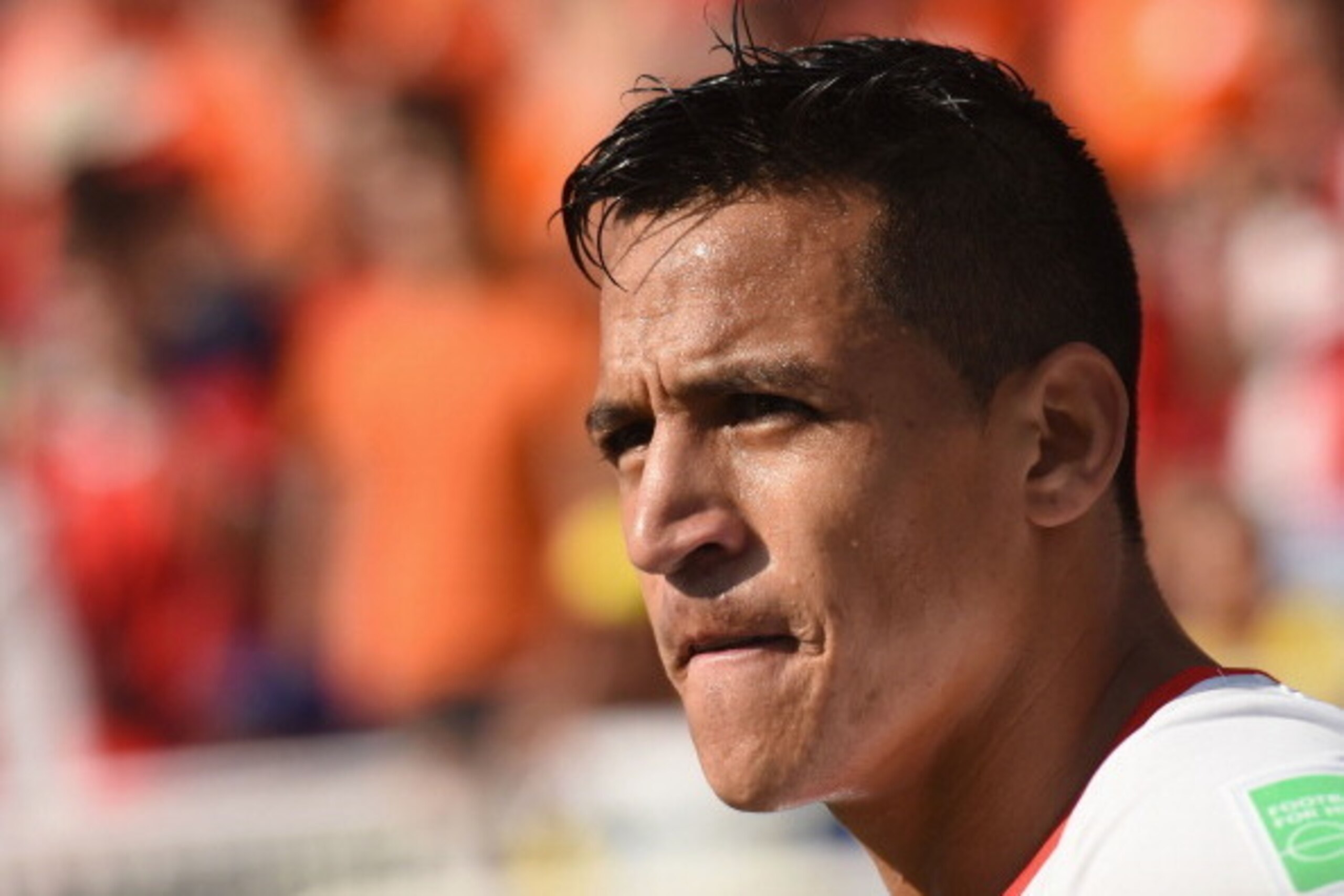 SAO PAULO, BRAZIL - JUNE 23:  Alexis Sanchez of Chile looks on during the 2014 FIFA World Cup Brazil Group B match between the Netherlands and Chile at Arena de Sao Paulo on June 23, 2014 in Sao Paulo, Brazil.  (Photo by Matthias Hangst/Getty Images)