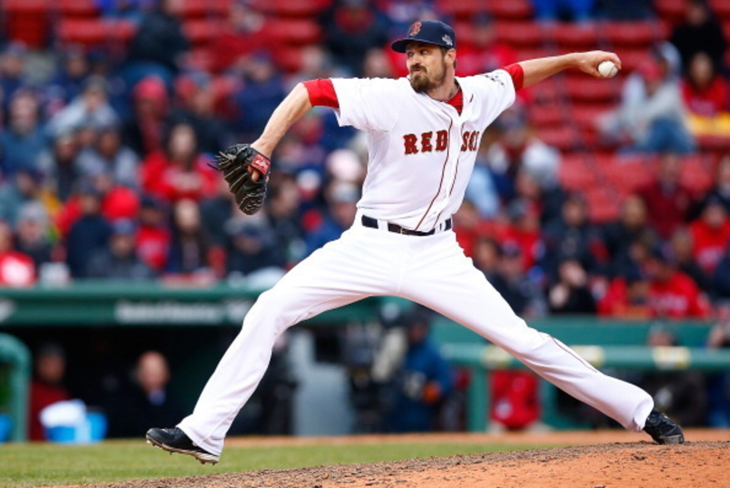 BOSTON, MA - APRIL 04:  Andrew Miller #30 of the Boston Red Sox pitches against the Milwaukee Brewers during the Opening Day game at Fenway Park on April 4, 2014 in Boston, Massachusetts.  (Photo by Jared Wickerham/Getty Images)