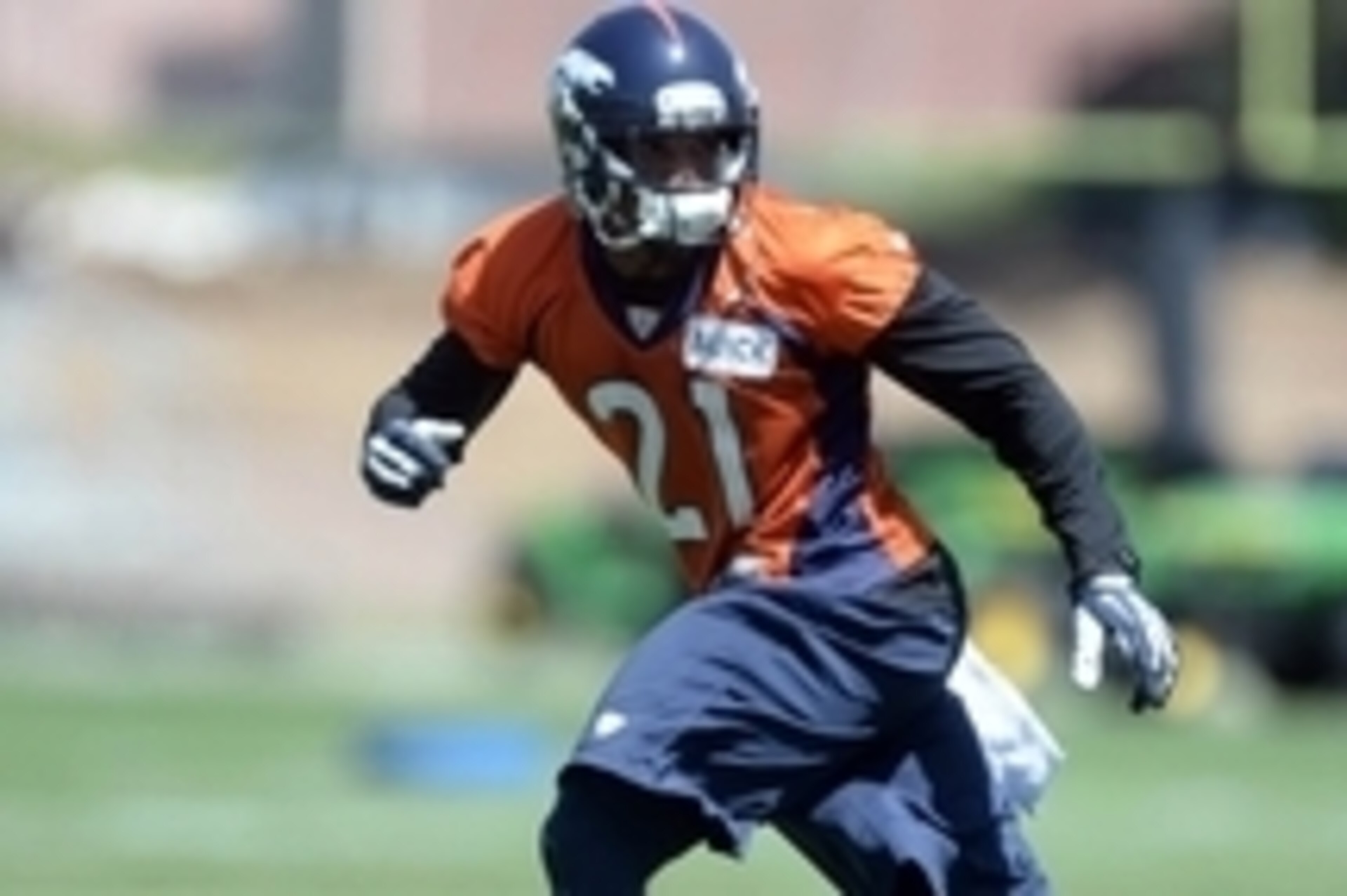 Jun 10, 2014; Denver, CO, USA; Denver Broncos cornerback Aqib Talib (21) runs a play during mini camp drills at the Broncos practice facility. Mandatory Credit: Ron Chenoy-USA TODAY Sports