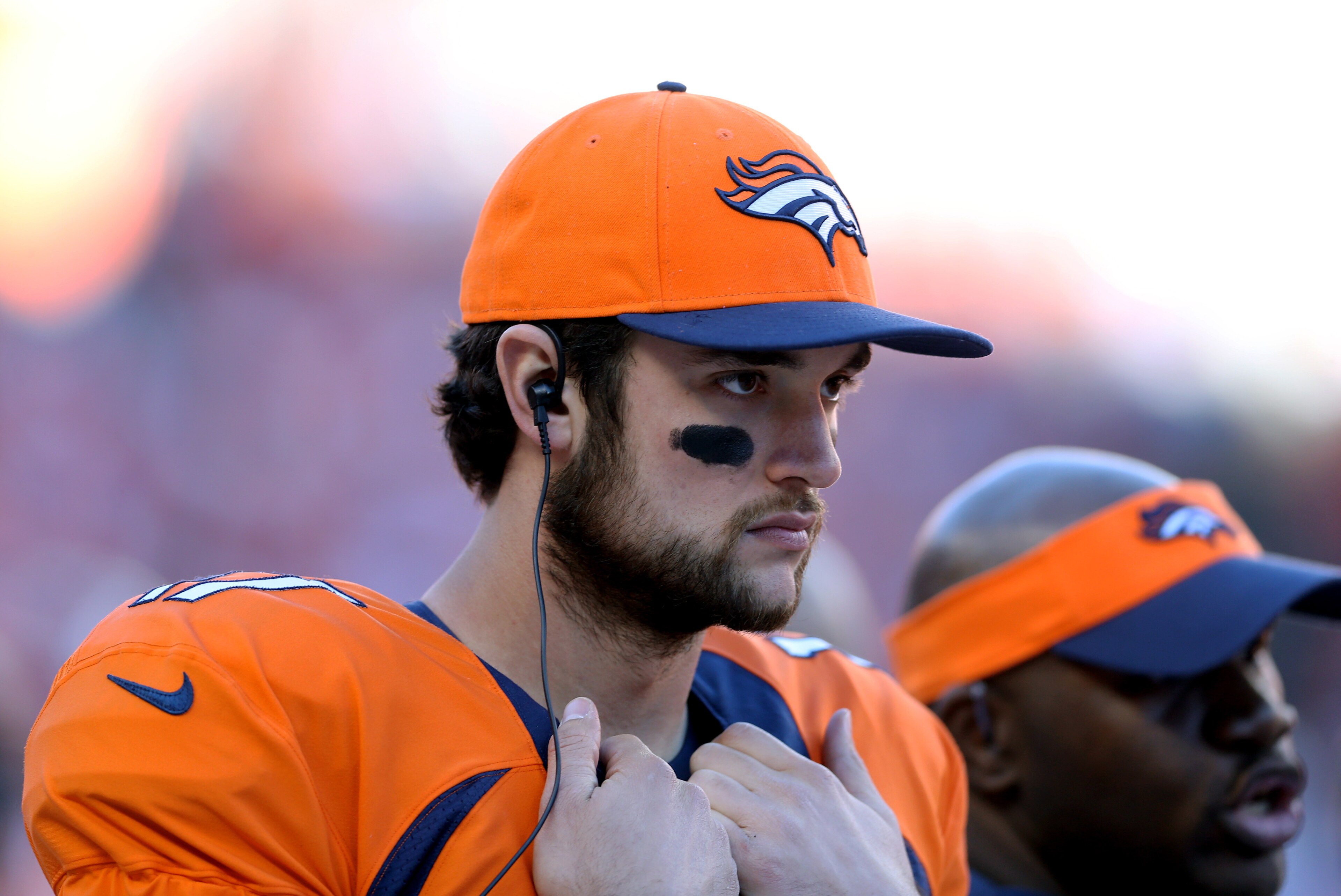 Jan 19, 2014; Denver, CO, USA; Denver Broncos quarterback Brock Osweiler (17) against the New England Patriots during the 2013 AFC Championship football game at Sports Authority Field at Mile High. Mandatory Credit: Mark J. Rebilas-USA TODAY Sports