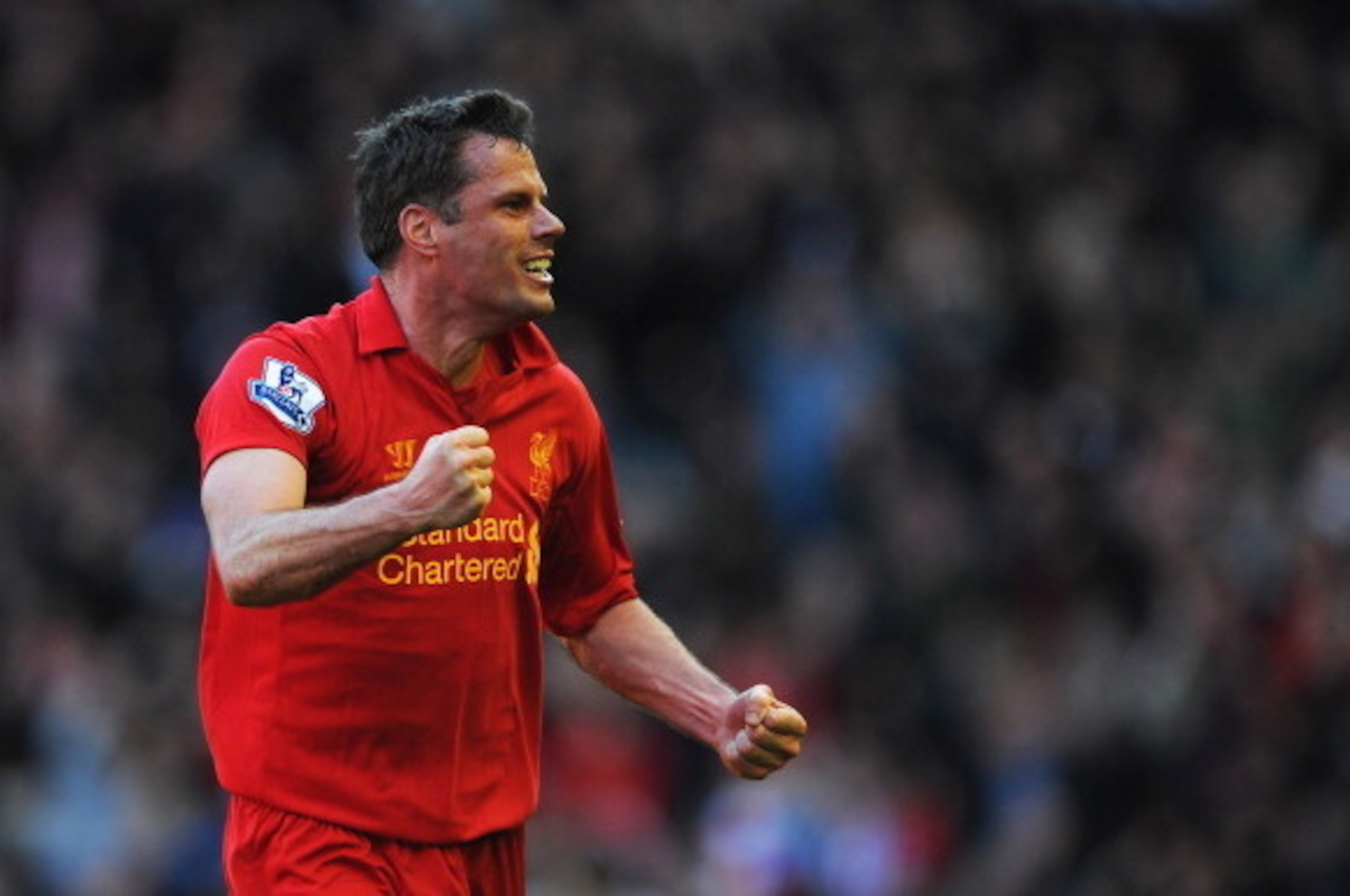 LIVERPOOL, ENGLAND - APRIL 21: Jamie Carragher of Liverpool celebrates the equalising goal scored by Luis Suarez during the Barclays Premier League match between Liverpool and Chelsea at Anfield on April 21, 2013 in Liverpool, England. (Photo by Michael LIVERPOOL, ENGLAND - APRIL 21: Jamie Carragher of Liverpool celebrates the equalising goal scored by Luis Suarez during the Barclays Premier League match between Liverpool and Chelsea at Anfield on April 21, 2013 in Liverpool, England. (Photo by Michael