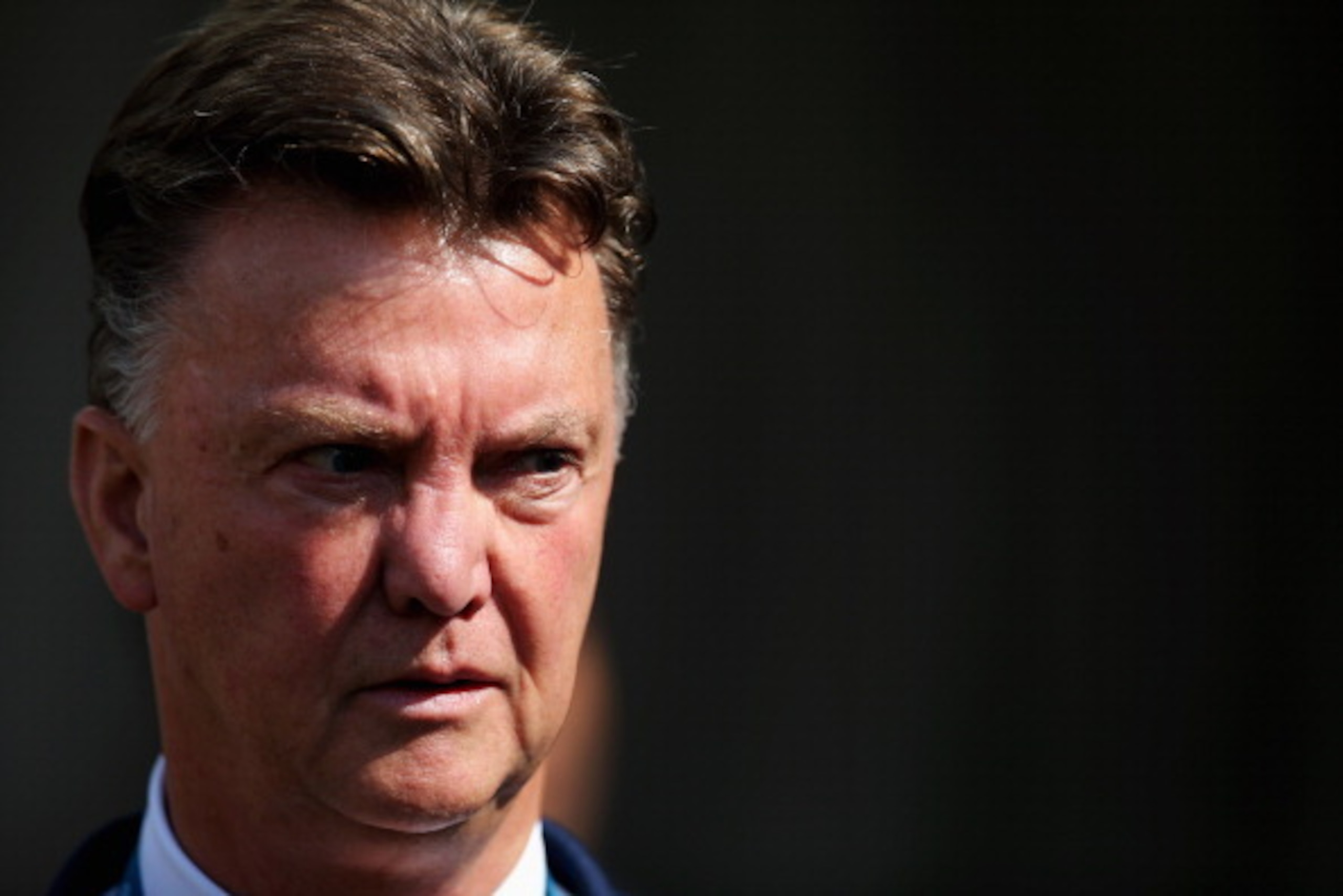 SAO PAULO, BRAZIL - JUNE 23:  Head coach Louis van Gaal of the Netherlands looks on prior to the 2014 FIFA World Cup Brazil Group B match between the Netherlands and Chile at Arena de Sao Paulo on June 23, 2014 in Sao Paulo, Brazil. (Photo by Dean Mouhtar