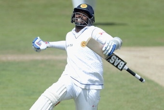 LEEDS, ENGLAND - JUNE 23:  Angelo Mathews of Sri Lanka celebrates reaching his century during day four of 2nd Investec Test match between England and Sri Lanka at Headingley Cricket Ground on June 23, 2014 in Leeds, England.  (Photo by Gareth Copley/Getty