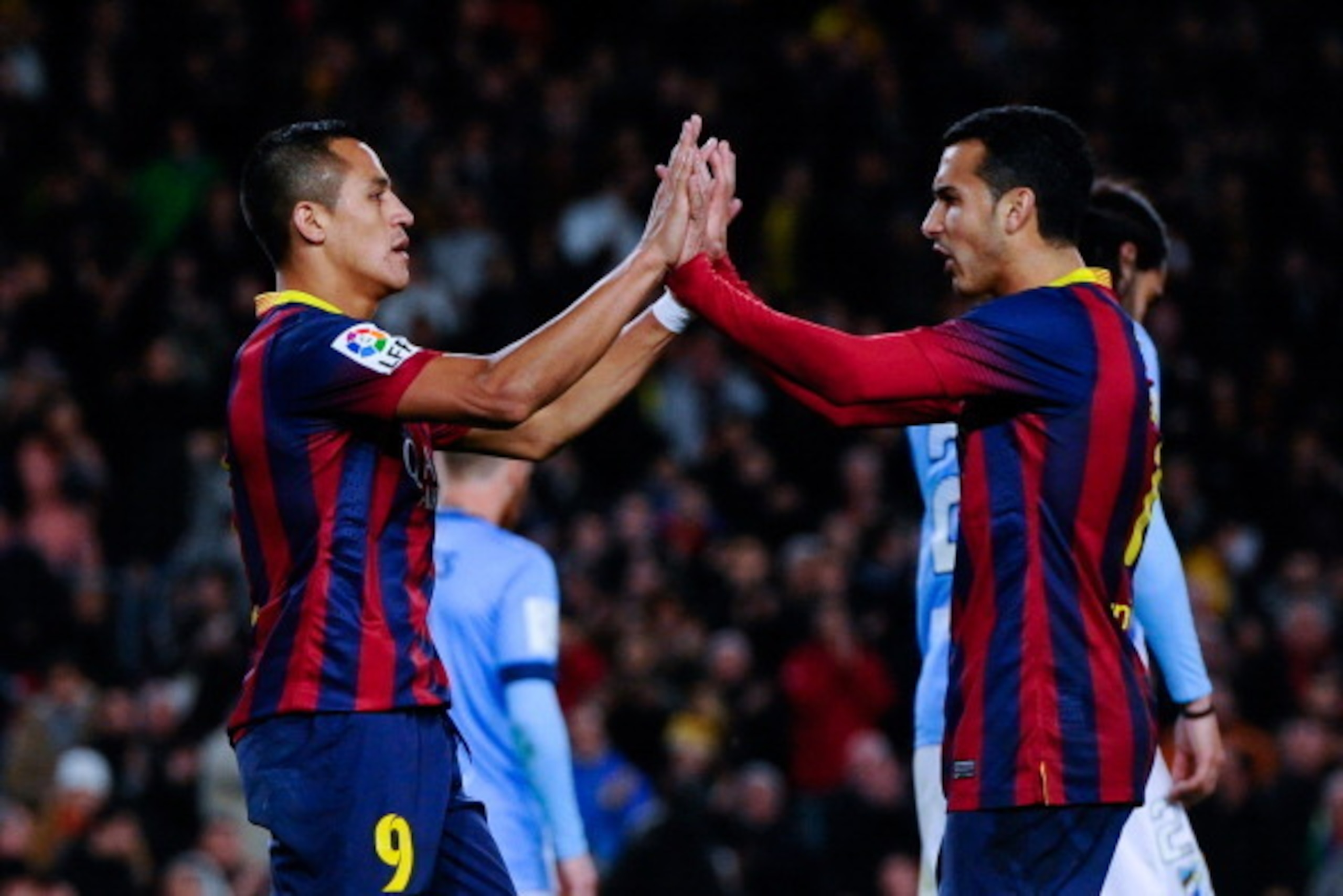 BARCELONA, SPAIN - JANUARY 26: Alexis Sanchez (L) of FC Barcelona celebrates with his team mate Pedro Rodriguez after scoring his team's third goal during the La Liga match between FC Barcelona and Malaga CF at Camp Nou on January 26, 2014 in Barcelona, BARCELONA, SPAIN - JANUARY 26: Alexis Sanchez (L) of FC Barcelona celebrates with his team mate Pedro Rodriguez after scoring his team's third goal during the La Liga match between FC Barcelona and Malaga CF at Camp Nou on January 26, 2014 in Barcelona,