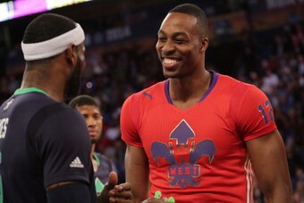 NEW ORLEANS, LA - FEBRUARY 16: Dwight Howard #12 of the Western Conference All-Stars talks with LeBron James #6 of the Eastern Conference All-Stars  during the 2014 NBA All-Star Game at Smoothie King Center on February 16, 2014 in New Orleans, Louisiana. 