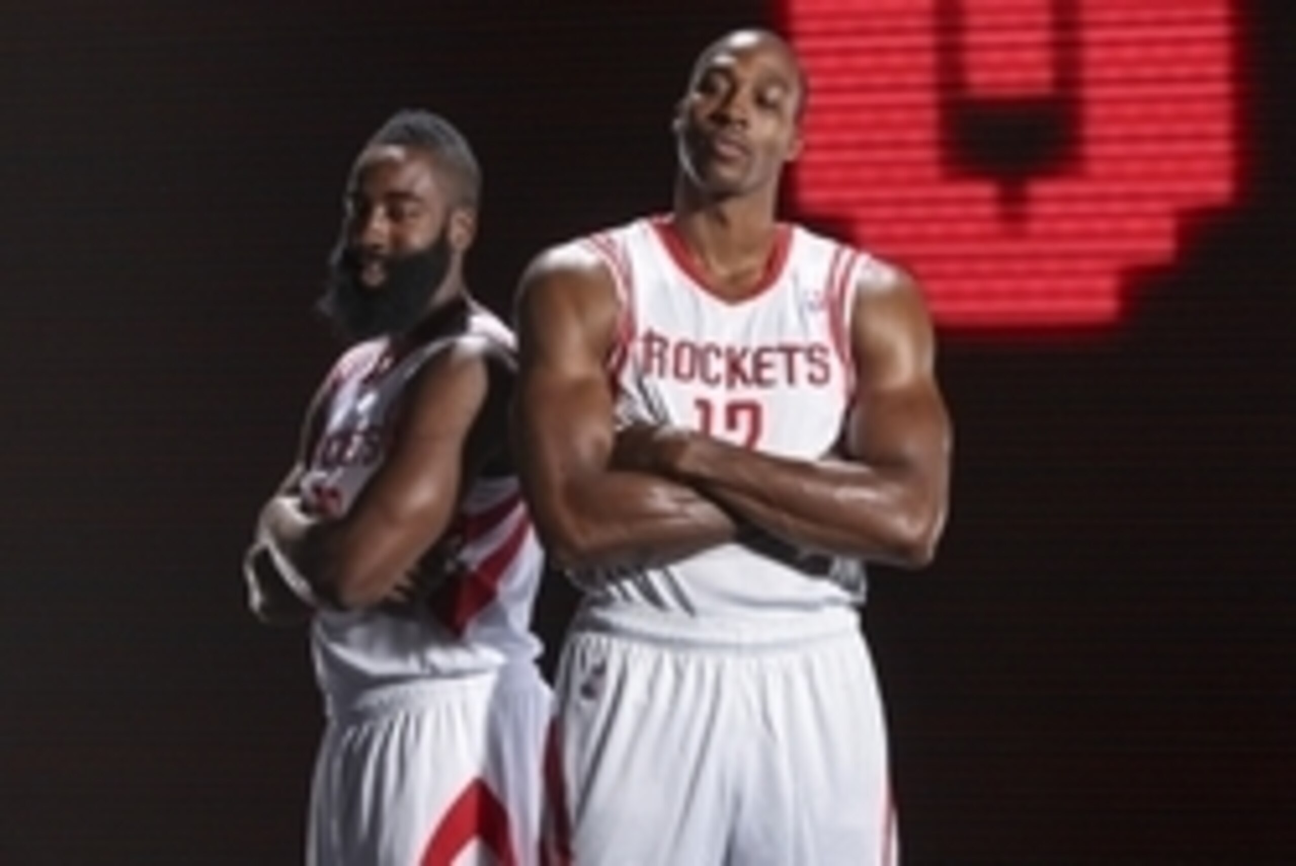 Sep 27, 2013; Houston, TX, USA;  Houston Rockets shooting guard James Harden (13) and center Dwight Howard (12) pose for a picture during media day at Toyota Center. Mandatory Credit: Troy Taormina-USA TODAY Sports