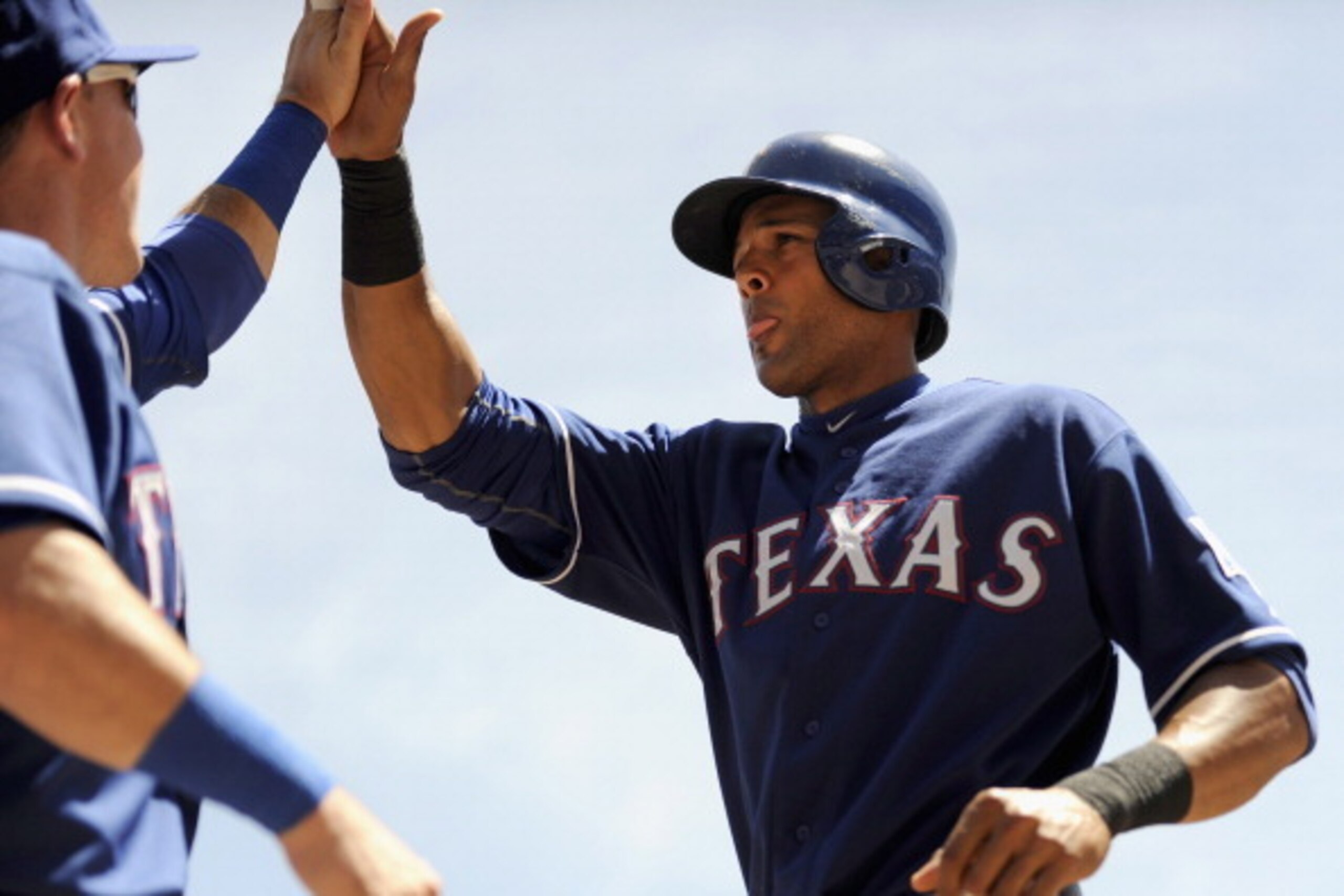 MINNEAPOLIS, MN - MAY 29: Alex Rios #51 of the Texas Rangers celebrates scoring a run against the Minnesota Twins during the second inning of the game on May 29, 2014 at Target Field in Minneapolis, Minnesota. (Photo by Hannah Foslien/Getty Images) MINNEAPOLIS, MN - MAY 29: Alex Rios #51 of the Texas Rangers celebrates scoring a run against the Minnesota Twins during the second inning of the game on May 29, 2014 at Target Field in Minneapolis, Minnesota. (Photo by Hannah Foslien/Getty Images)