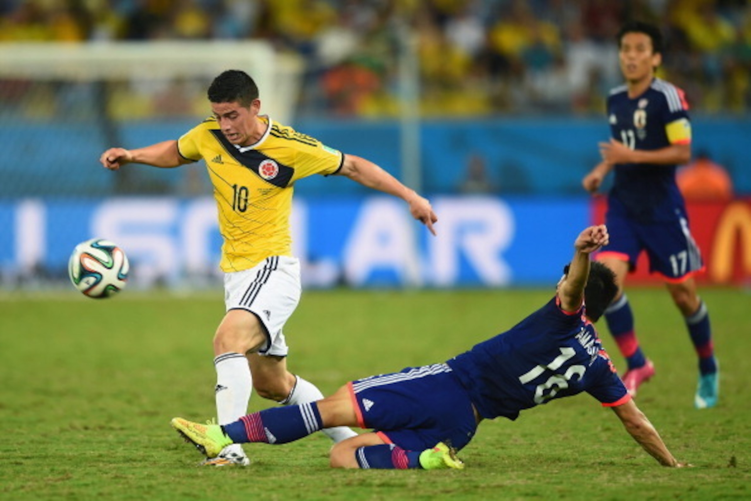 CUIABA, BRAZIL - JUNE 24: James Rodriguez of Colombia shoots and scores his team's fourth goal during the 2014 FIFA World Cup Brazil Group C match between Japan and Colombia at Arena Pantanal on June 24, 2014 in Cuiaba, Brazil. (Photo by Christopher CUIABA, BRAZIL - JUNE 24: James Rodriguez of Colombia shoots and scores his team's fourth goal during the 2014 FIFA World Cup Brazil Group C match between Japan and Colombia at Arena Pantanal on June 24, 2014 in Cuiaba, Brazil. (Photo by Christopher