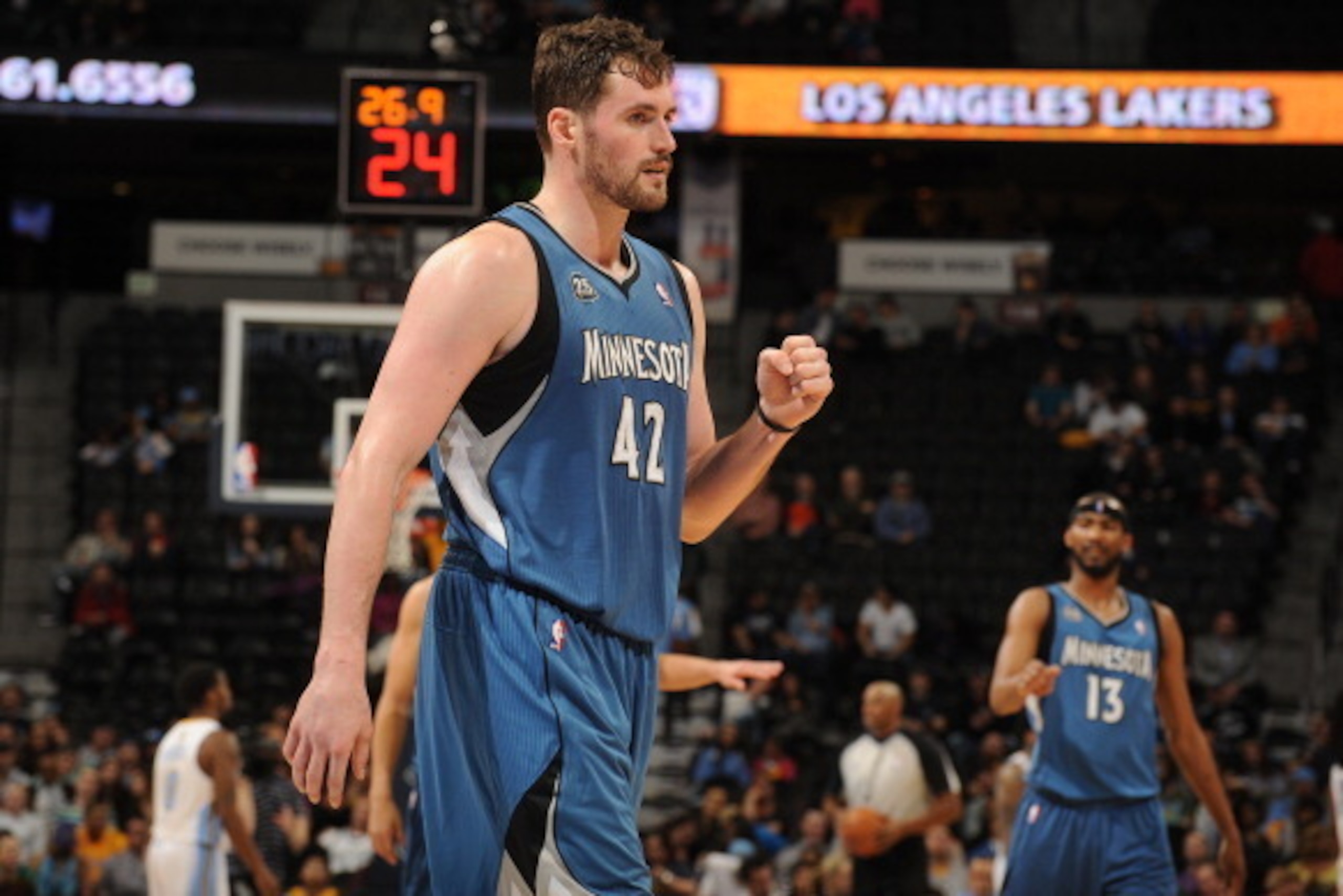 DENVER, CO - March 3: Kevin Love #42 of the Minnesota Timberwolves celebrates during the game against the Denver Nuggets on March 3, 2014 at the Pepsi Center in Denver, Colorado. NOTE TO USER: User expressly acknowledges and agrees that, by downloading an DENVER, CO - March 3: Kevin Love #42 of the Minnesota Timberwolves celebrates during the game against the Denver Nuggets on March 3, 2014 at the Pepsi Center in Denver, Colorado. NOTE TO USER: User expressly acknowledges and agrees that, by downloading an