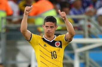 CUIABA, BRAZIL - JUNE 24:  James Rodriguez of Colombia celebrates during the 2014 FIFA World Cup Brazil Group C match between Japan and Colombia at Arena Pantanal on June 24, 2014 in Cuiaba, Brazil.  (Photo by Elsa/Getty Images)