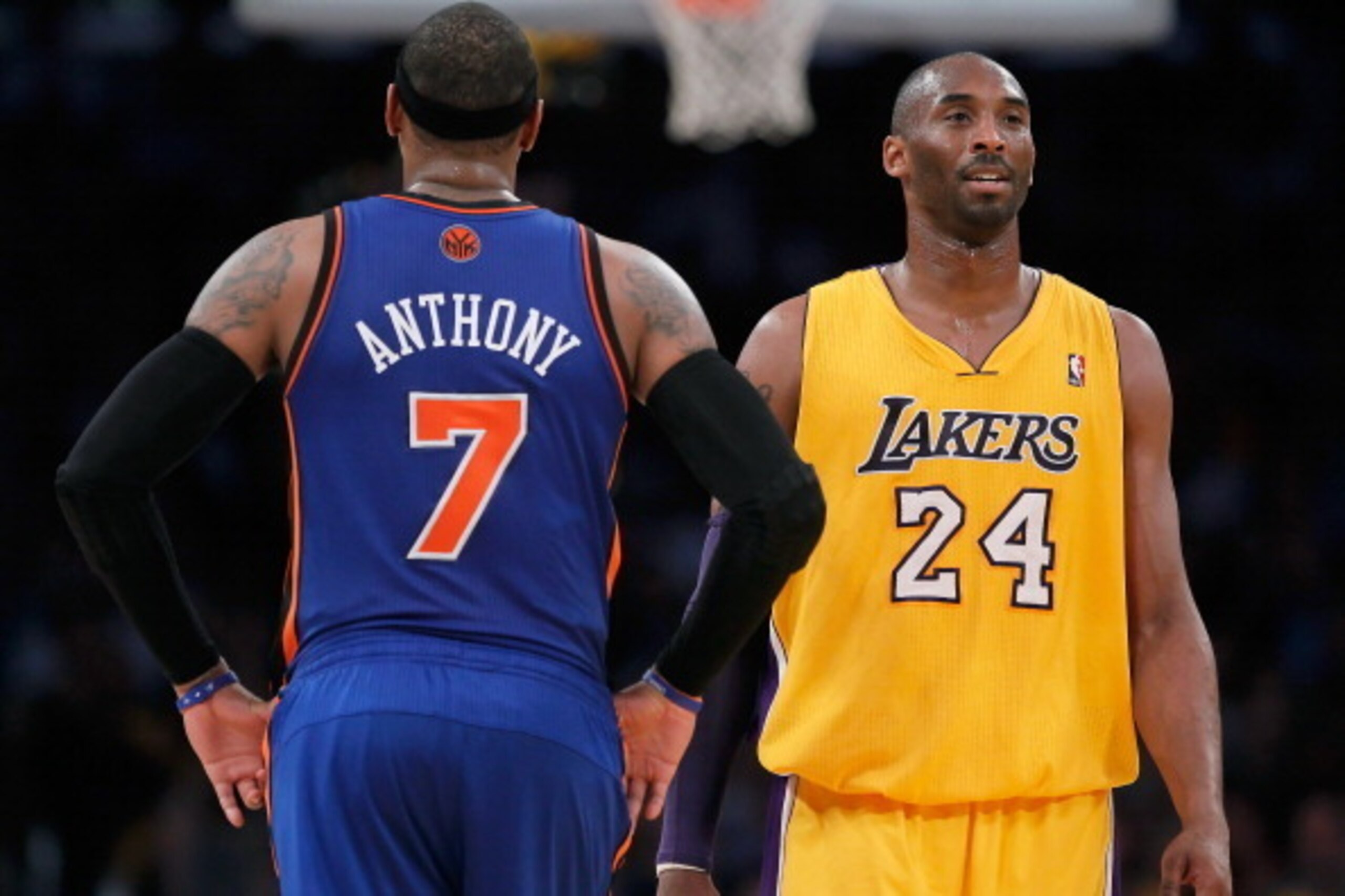 LOS ANGELES, CA - DECEMBER 29:  Carmelo Anthony #7 of the New York Knicks and Kobe Bryant #24 of the Los Angeles Lakers talk during the first half at Staples Center on December 29, 2011 in Los Angeles, California. NOTE TO USER: User expressly acknowledges
