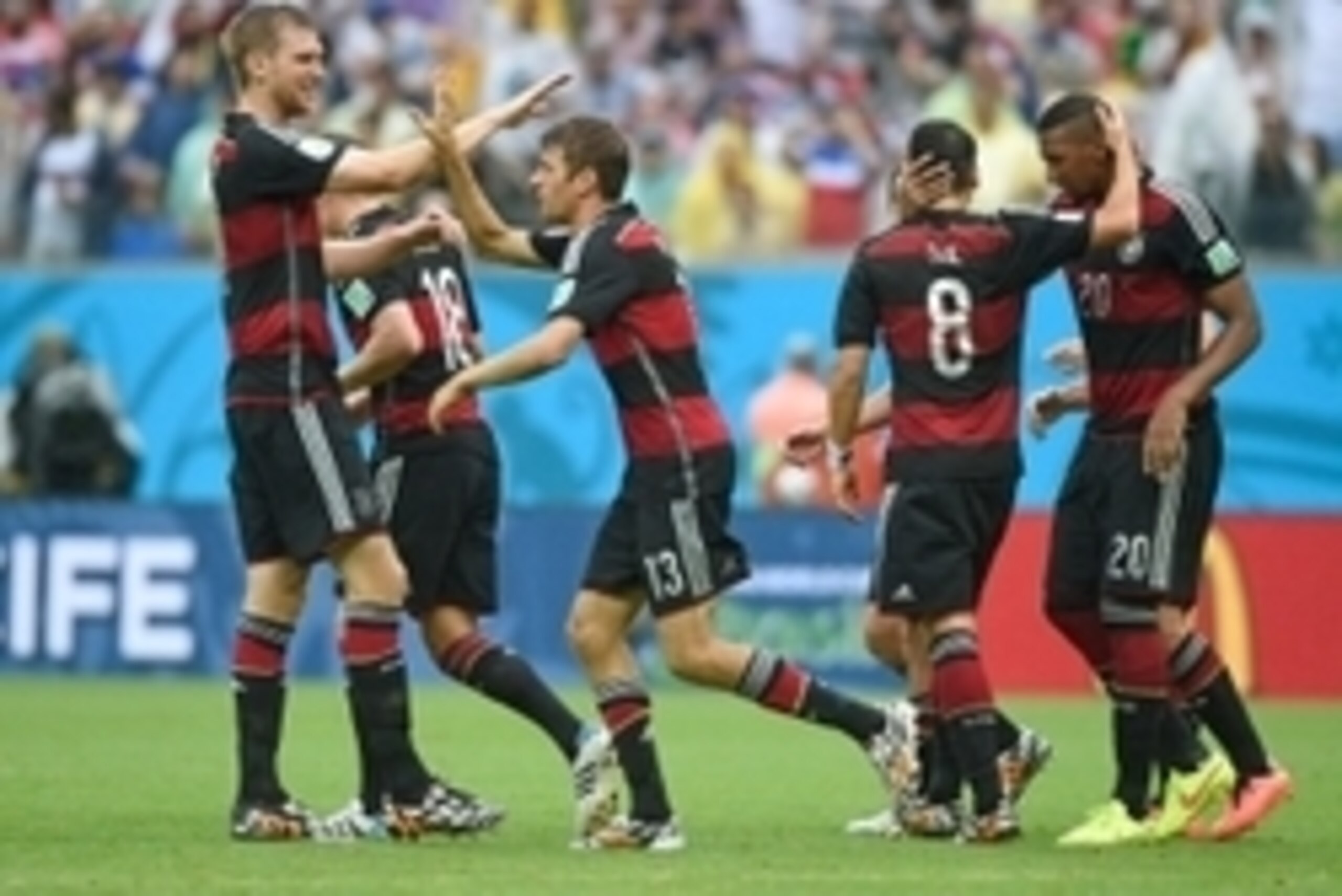 June 26, 2014; Recife, BRAZIL; Germany midfielder Thomas Muller (13) celebrates with teammates after scoring against the United States during the second half of the match during the 2014 World Cup at Arena Pernambuco.  Mandatory Credit: Tim Groothuis/Witt