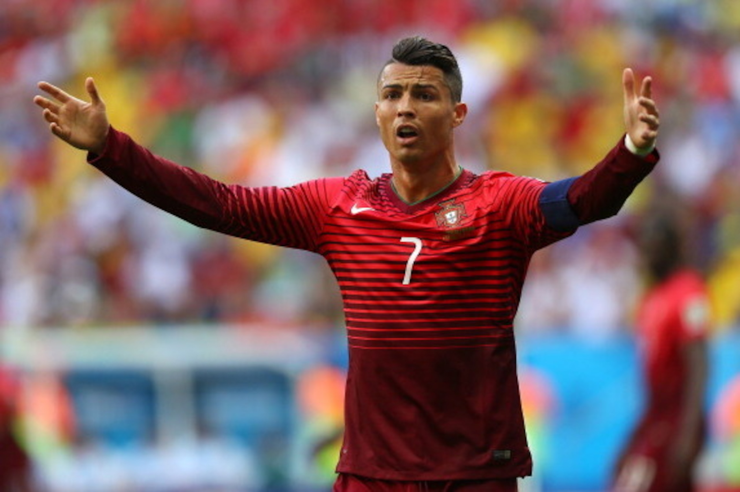 BRASILIA, BRAZIL - JUNE 26:  Cristiano Ronaldo of Portugal reacts after a missed chance during the 2014 FIFA World Cup Brazil Group G match between Portugal and Ghana at Estadio Nacional on June 26, 2014 in Brasilia, Brazil.  (Photo by Elsa/Getty Images)
