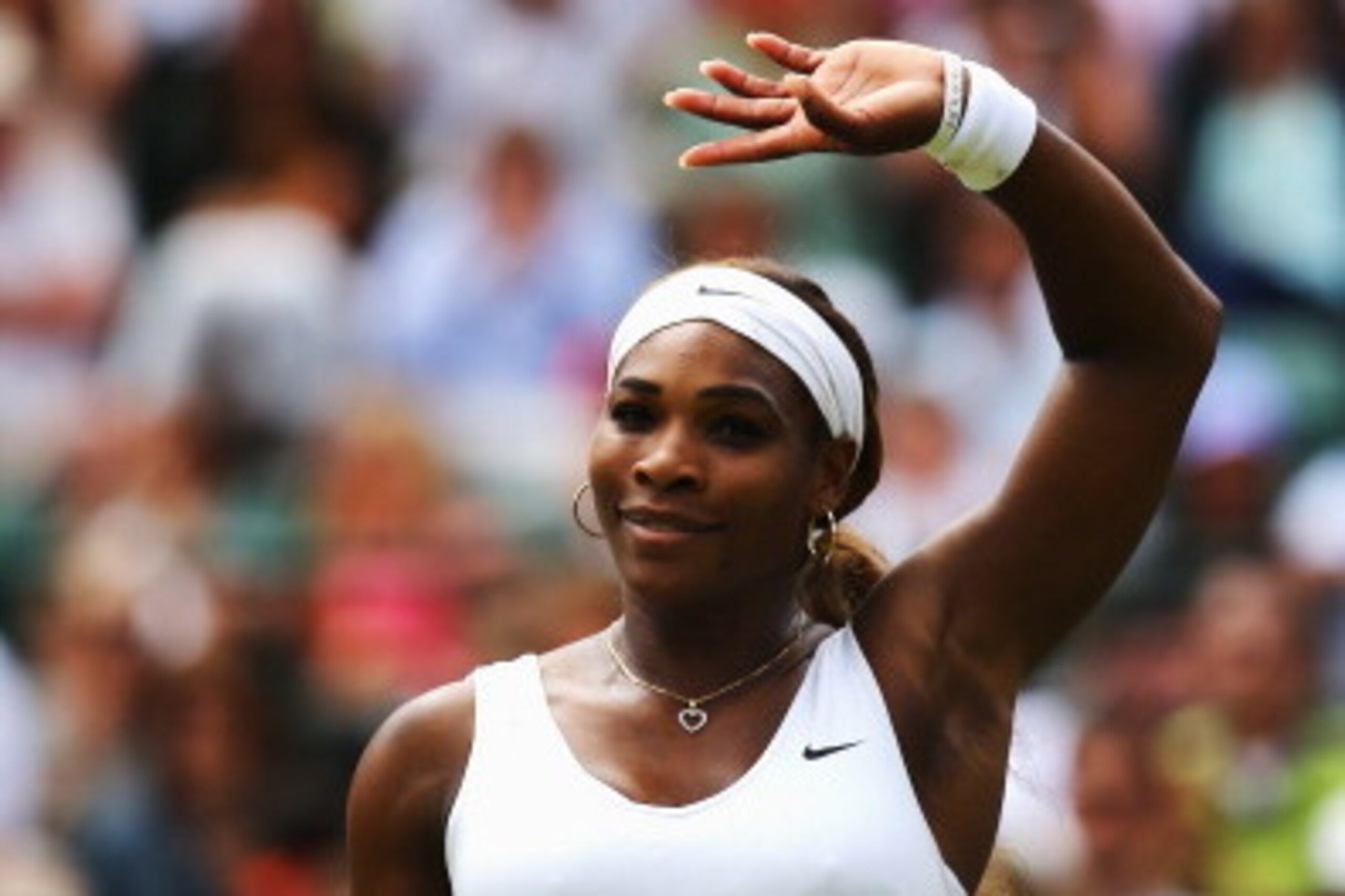 LONDON, ENGLAND - JUNE 26:  Serena Williams of the United celebrates after winning her Ladies' Singles second round match against Chanelle Scheepers of South Africa on day four of the Wimbledon Lawn Tennis Championships at the All England Lawn Tennis and 