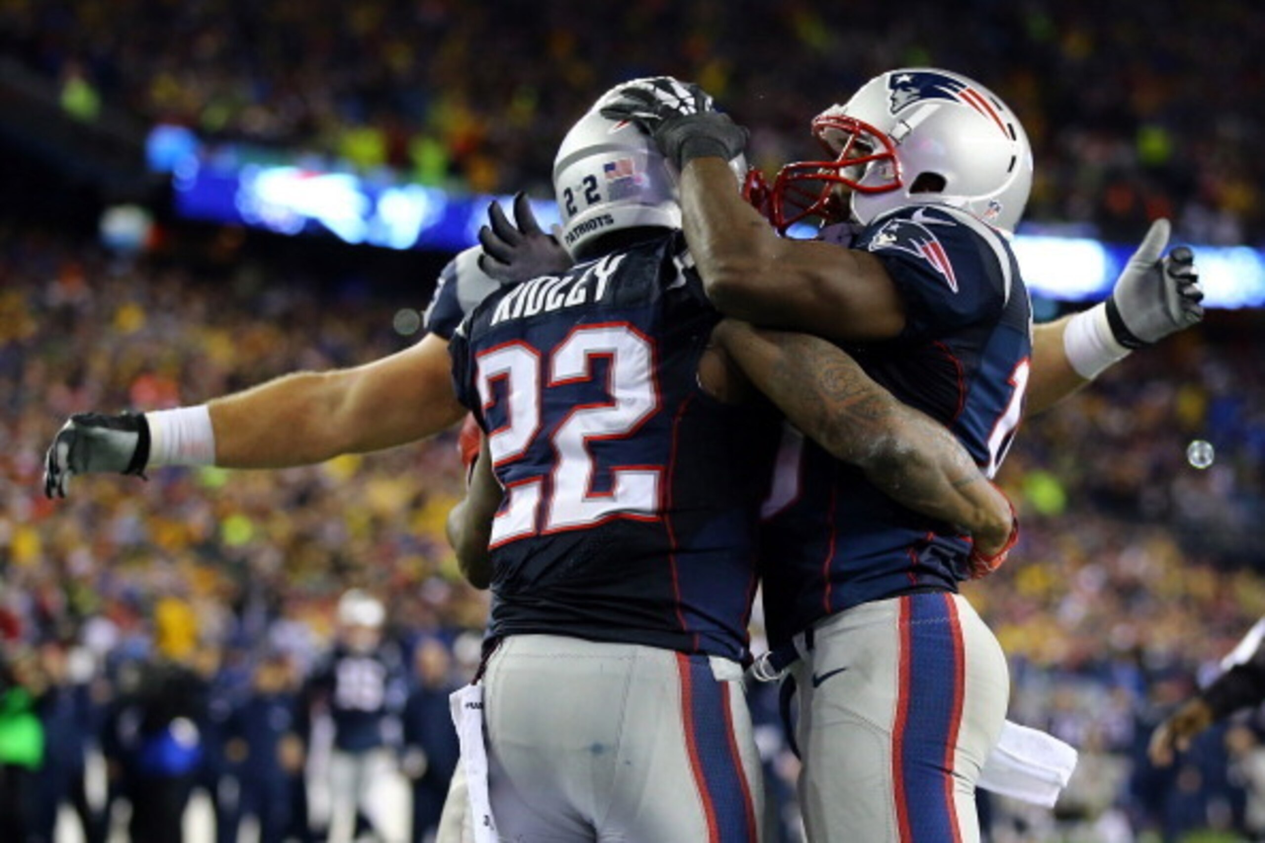 FOXBORO, MA - JANUARY 11:  Stevan Ridley #22 of the New England Patriots celebrates with teammates Matthew Slater #18 and James Develin #46 after scoring a touchdown in the fourth quarter against the Indianapolis Colts during the AFC Divisional Playoff ga