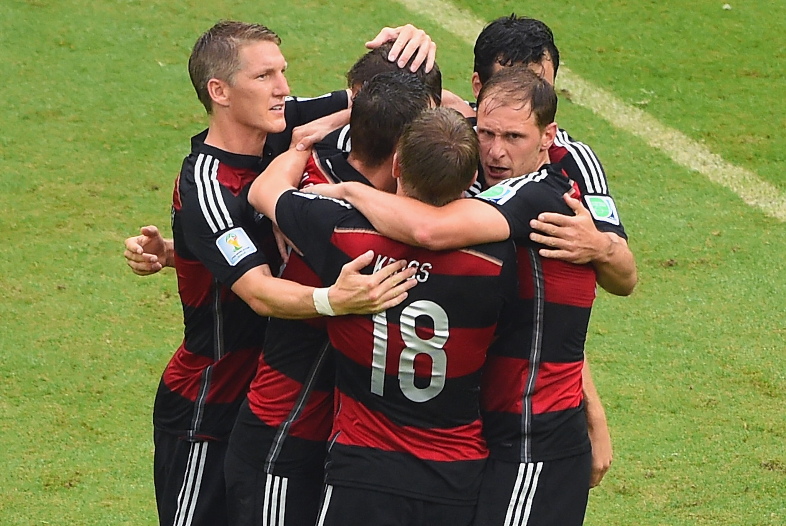 RECIFE, BRAZIL - JUNE 26:  Thomas Mueller of Germany celebrates scoring his team's first goal with teammates during the 2014 FIFA World Cup Brazil group G match between the United States and Germany at Arena Pernambuco on June 26, 2014 in Recife, Brazil.