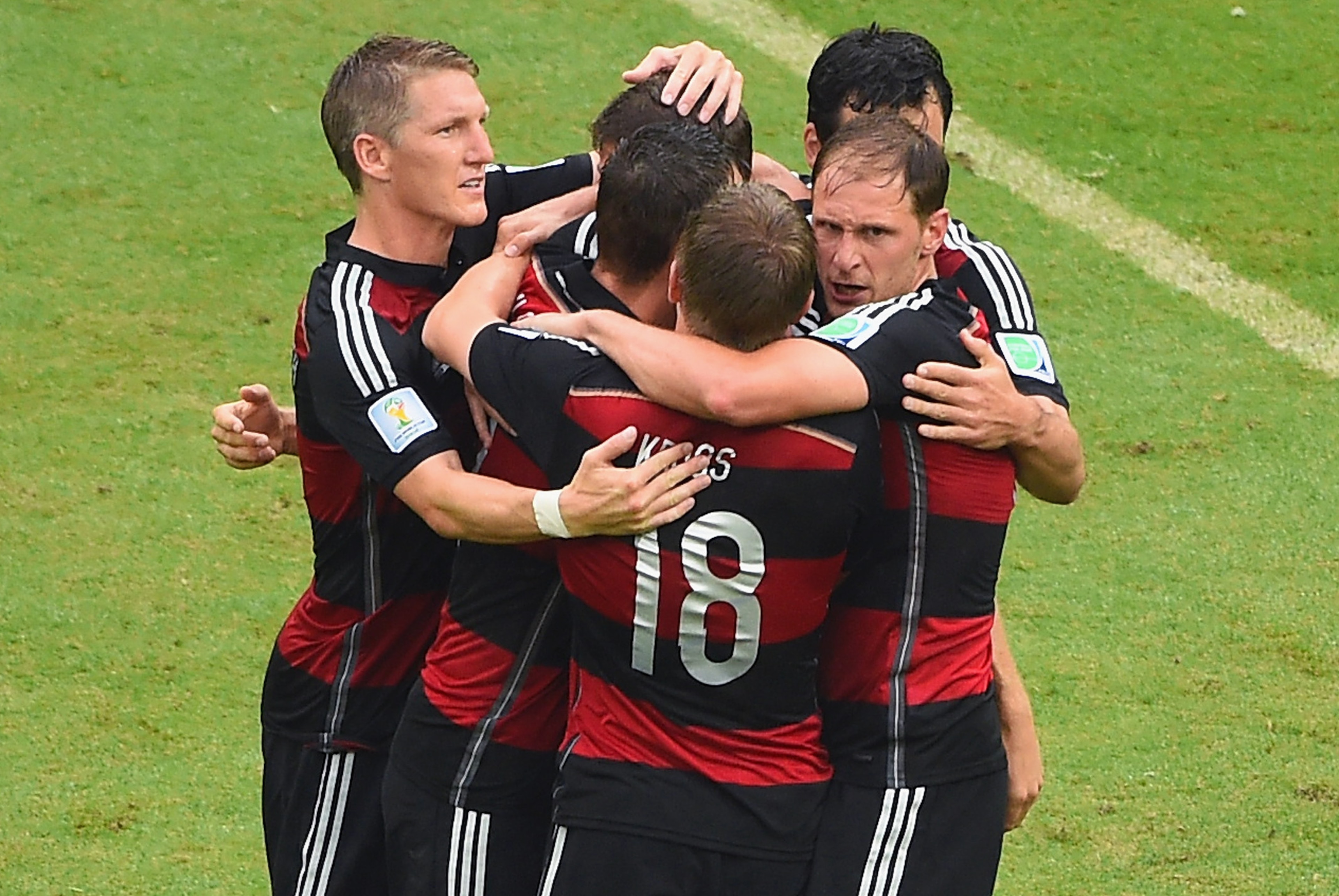 RECIFE, BRAZIL - JUNE 26:  Thomas Mueller of Germany celebrates scoring his team's first goal with teammates during the 2014 FIFA World Cup Brazil group G match between the United States and Germany at Arena Pernambuco on June 26, 2014 in Recife, Brazil.