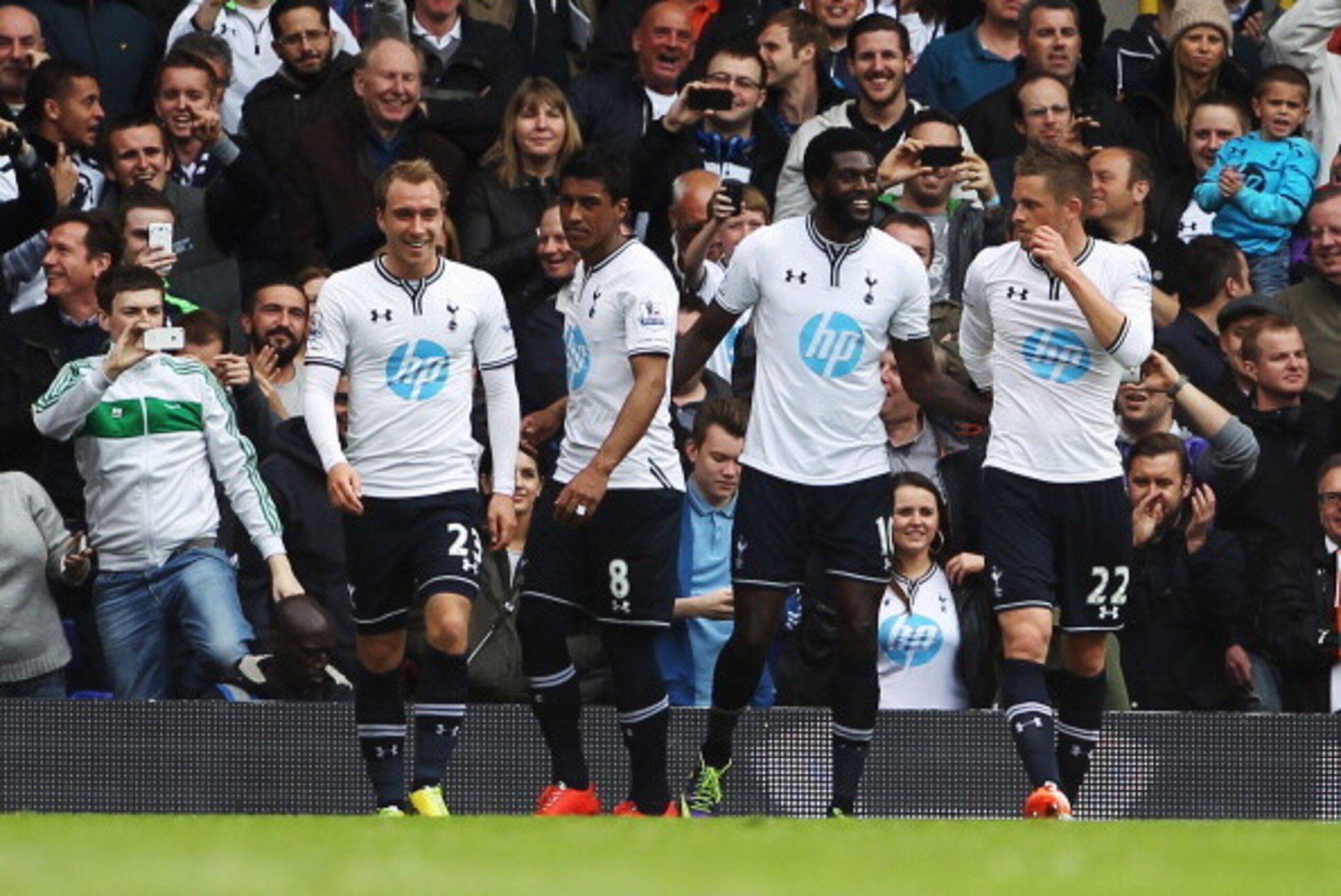 LONDON, ENGLAND - MAY 11: Emmanuel Adebayor (2nd right) of Tottenham Hotspur celebrates with team mates after scoring during the Barclays Premier League match between Tottenham Hotspur and Aston Villa at White Hart Lane on May 11, 2014 in London, England LONDON, ENGLAND - MAY 11: Emmanuel Adebayor (2nd right) of Tottenham Hotspur celebrates with team mates after scoring during the Barclays Premier League match between Tottenham Hotspur and Aston Villa at White Hart Lane on May 11, 2014 in London, England