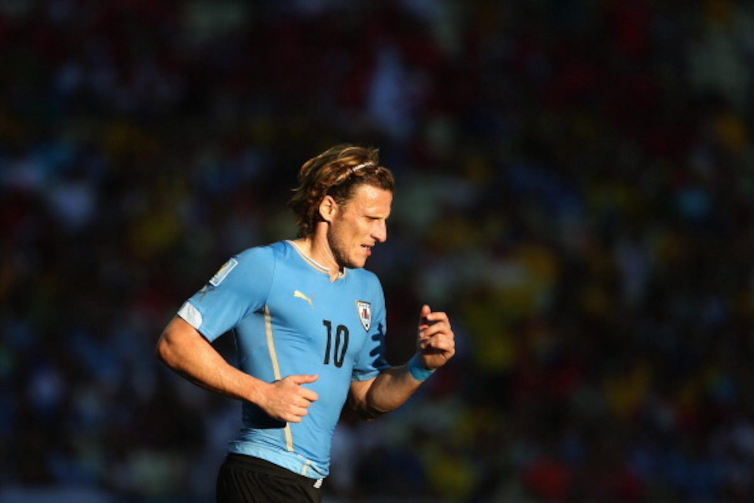 FORTALEZA, BRAZIL - JUNE 14:  Diego Forlan of Uruguay runs during the 2014 FIFA World Cup Brazil Group D match between Uruguay and Costa Rica at Castelao on June 14, 2014 in Fortaleza, Brazil.  (Photo by Robert Cianflone/Getty Images)