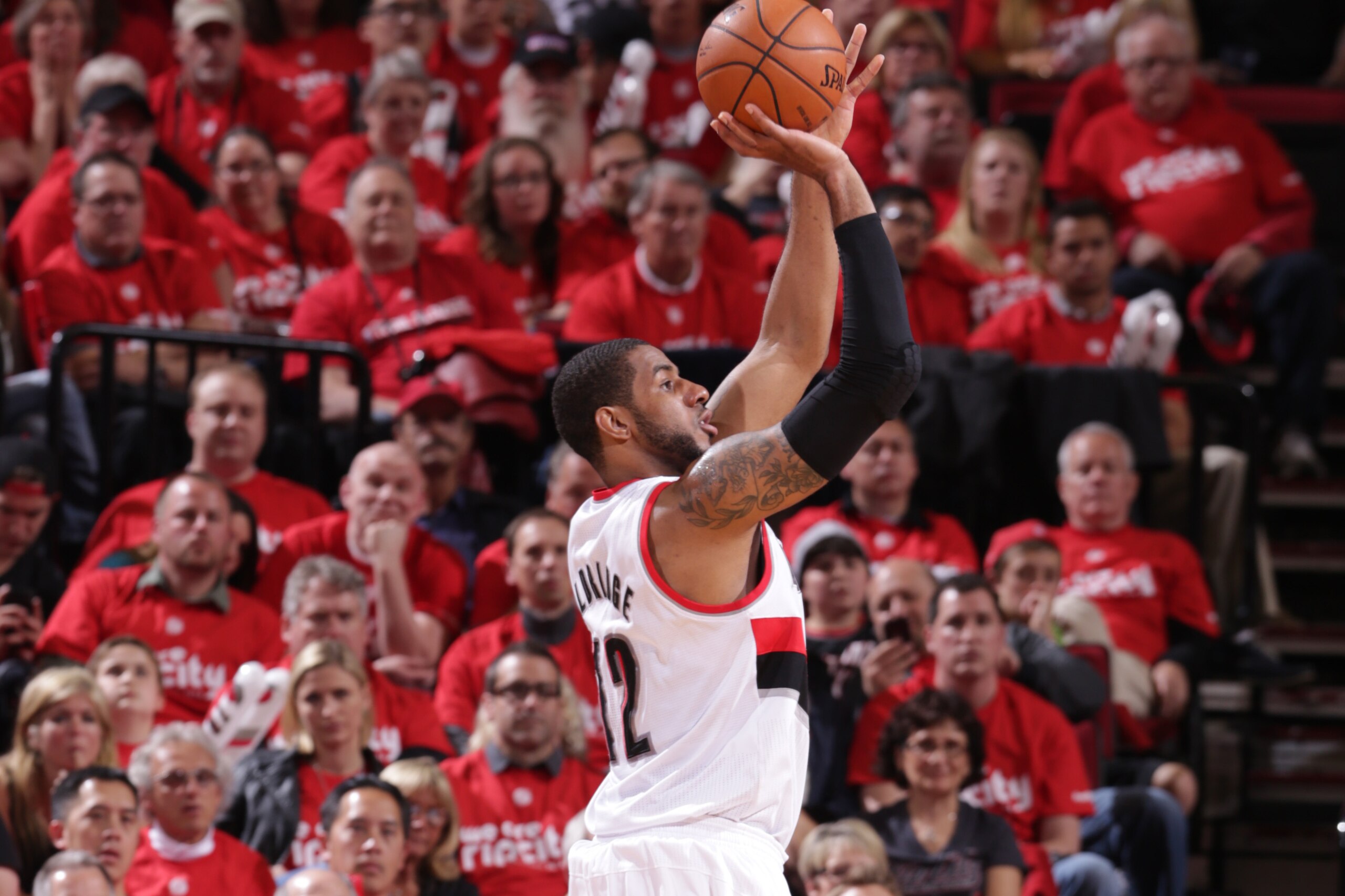 PORTLAND, OR - MAY 10:  LaMarcus Aldridge #12 of the Portland Trail Blazers shoots the ball in Game Three of the Western Conference Semifinals against the San Antonio Spurs during the 2014 NBA Playoffs on May 10, 2014 at the Moda Center in Portland, Orego