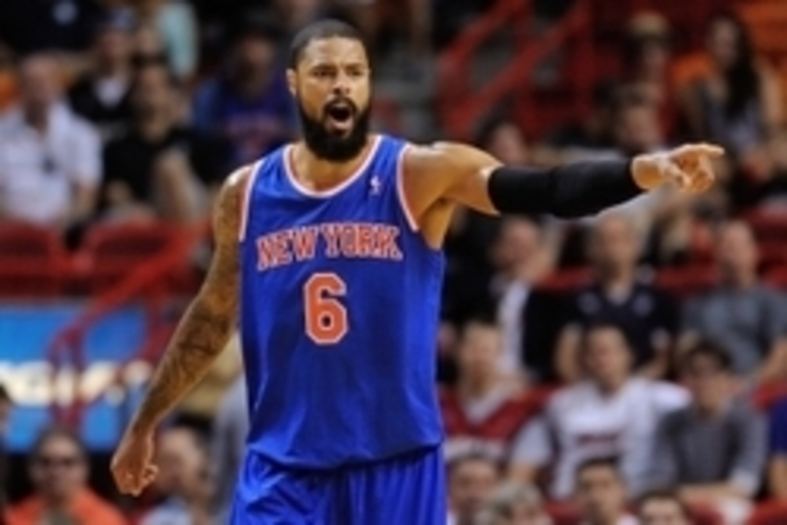Apr 6, 2014; Miami, FL, USA; New York Knicks center Tyson Chandler (6) reacts during the first half against the Miami Heat at American Airlines Arena. Mandatory Credit: Steve Mitchell-USA TODAY Sports