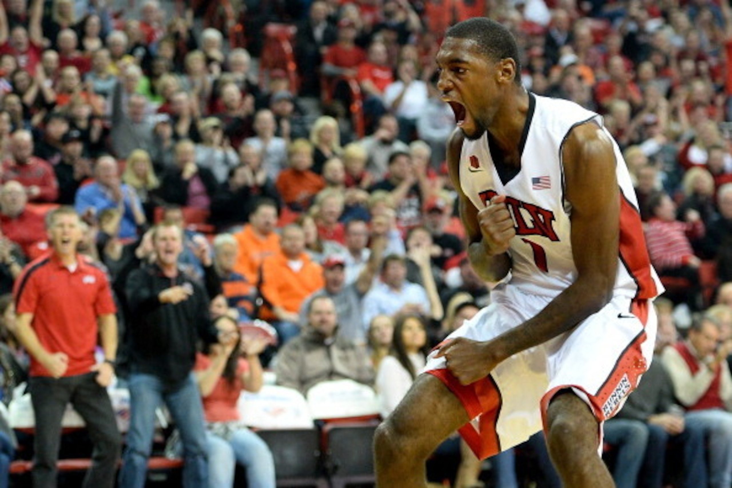 LAS VEGAS, NV - NOVEMBER 26:  Roscoe Smith #1 of the UNLV Rebels reacts after dunking against the Illinois Fighting Illini during their game at the Thomas & Mack Center on November 26, 2013 in Las Vegas, Nevada. Illinois won 61-59.  (Photo by Ethan Miller