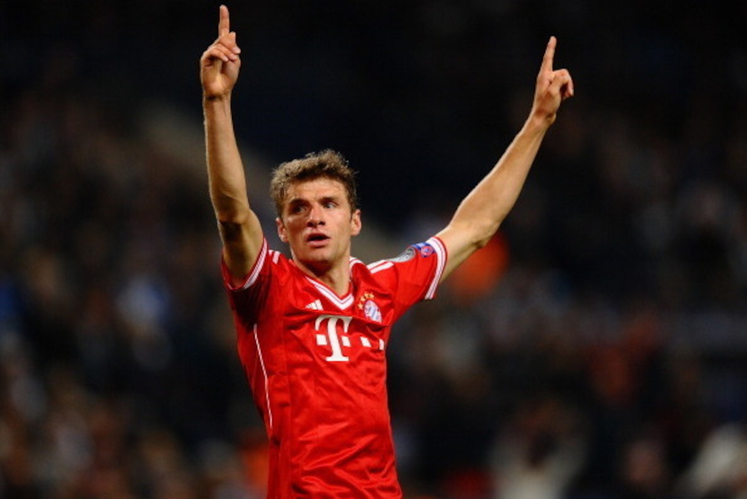 MANCHESTER, ENGLAND - OCTOBER 02:  Thomas Muller of FC Bayern Munchen celebrates scoring the second goal during the UEFA Champions League Group D match between Manchester City and  FC Bayern Munchen at Etihad Stadium on October 2, 2013 in Manchester, Engl