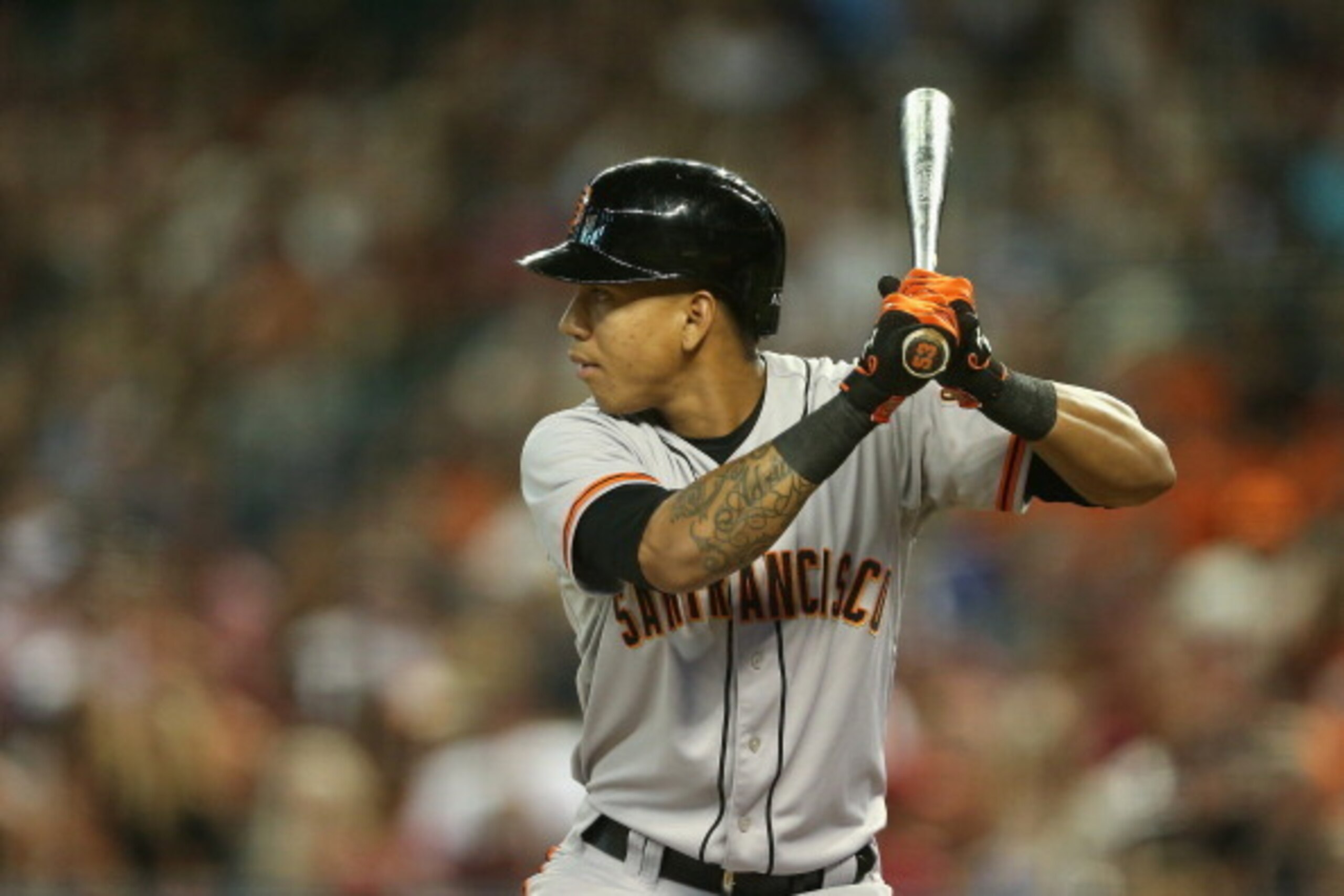 PHOENIX, AZ - JUNE 20:  Ehire Adrianza #6 of the San Francisco Giants bats against the Arizona Diamondbacks during the MLB game at Chase Field on June 20, 2014 in Phoenix, Arizona.  The Diamondbacks defeated the Giants 4-1  (Photo by Christian Petersen/Ge