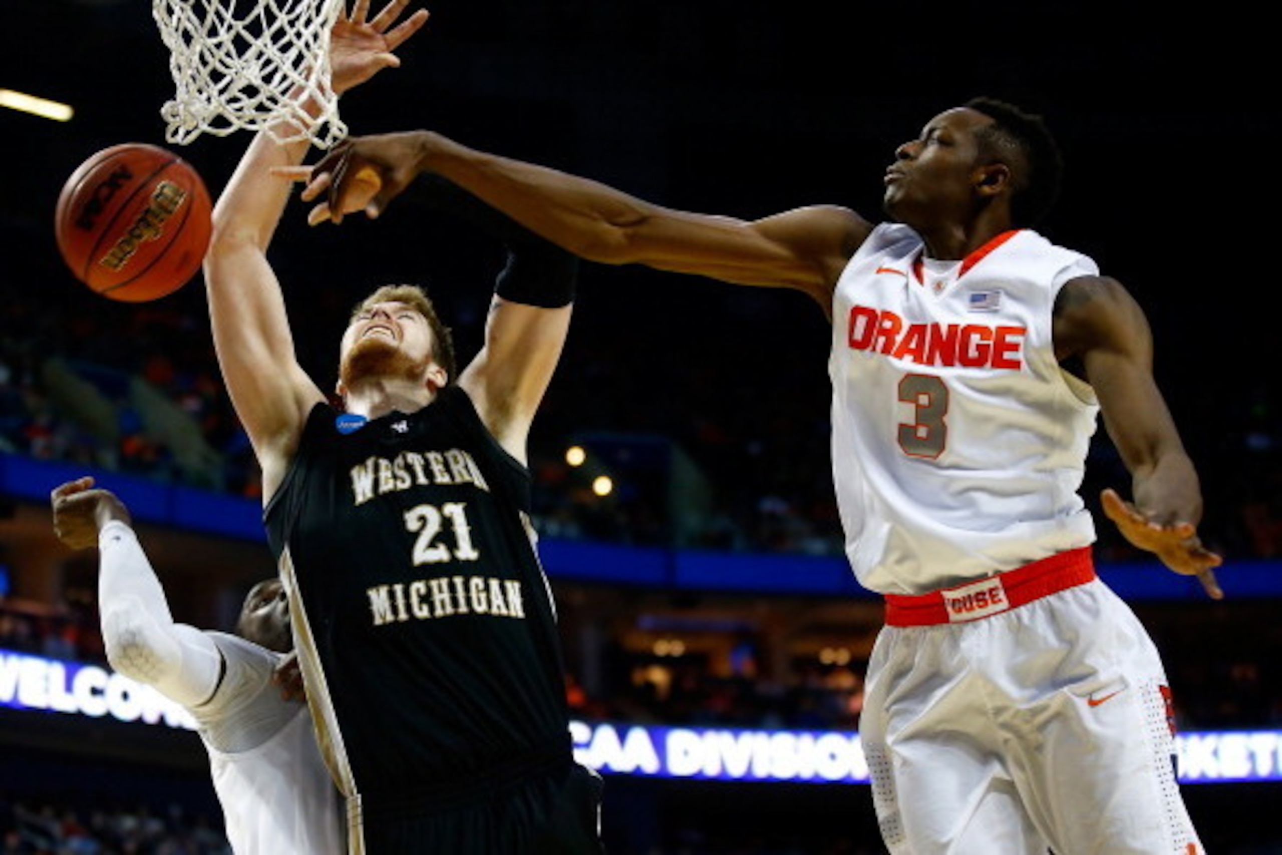 BUFFALO, NY - MARCH 20:  Jerami Grant #3 of the Syracuse Orange blocks a shot by Shayne Whittington #21 of the Western Michigan Broncos during the second round of the 2014 NCAA Men's Basketball Tournament at the First Niagara Center on March 20, 2014 in B