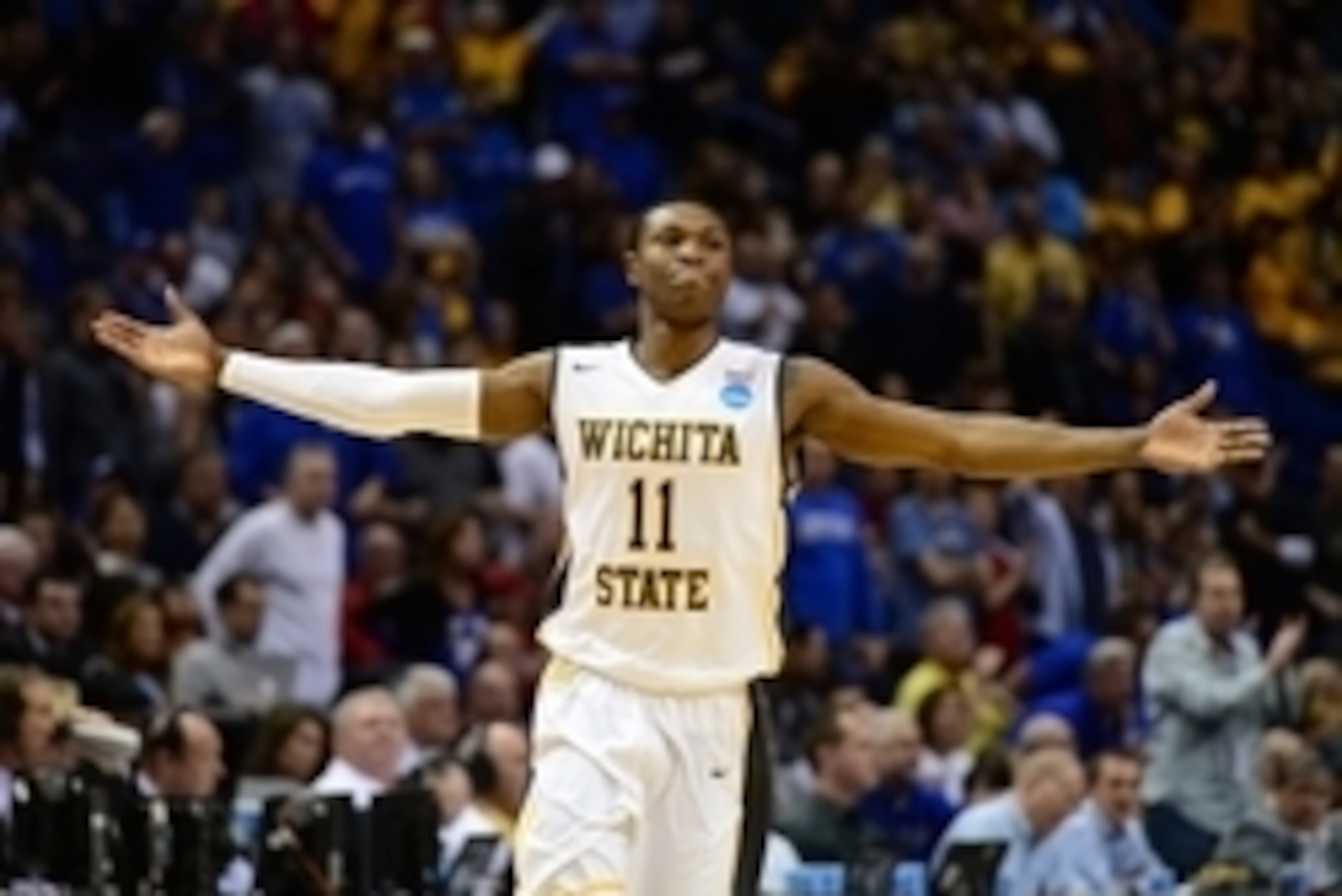 Mar 23, 2014; St. Louis, MO, USA; Wichita State Shockers forward Cleanthony Early (11) reacts after scoring against the Kentucky Wildcats during the second half in the third round of the 2014 NCAA Men's Basketball Championship at Scottrade Center. Mandato