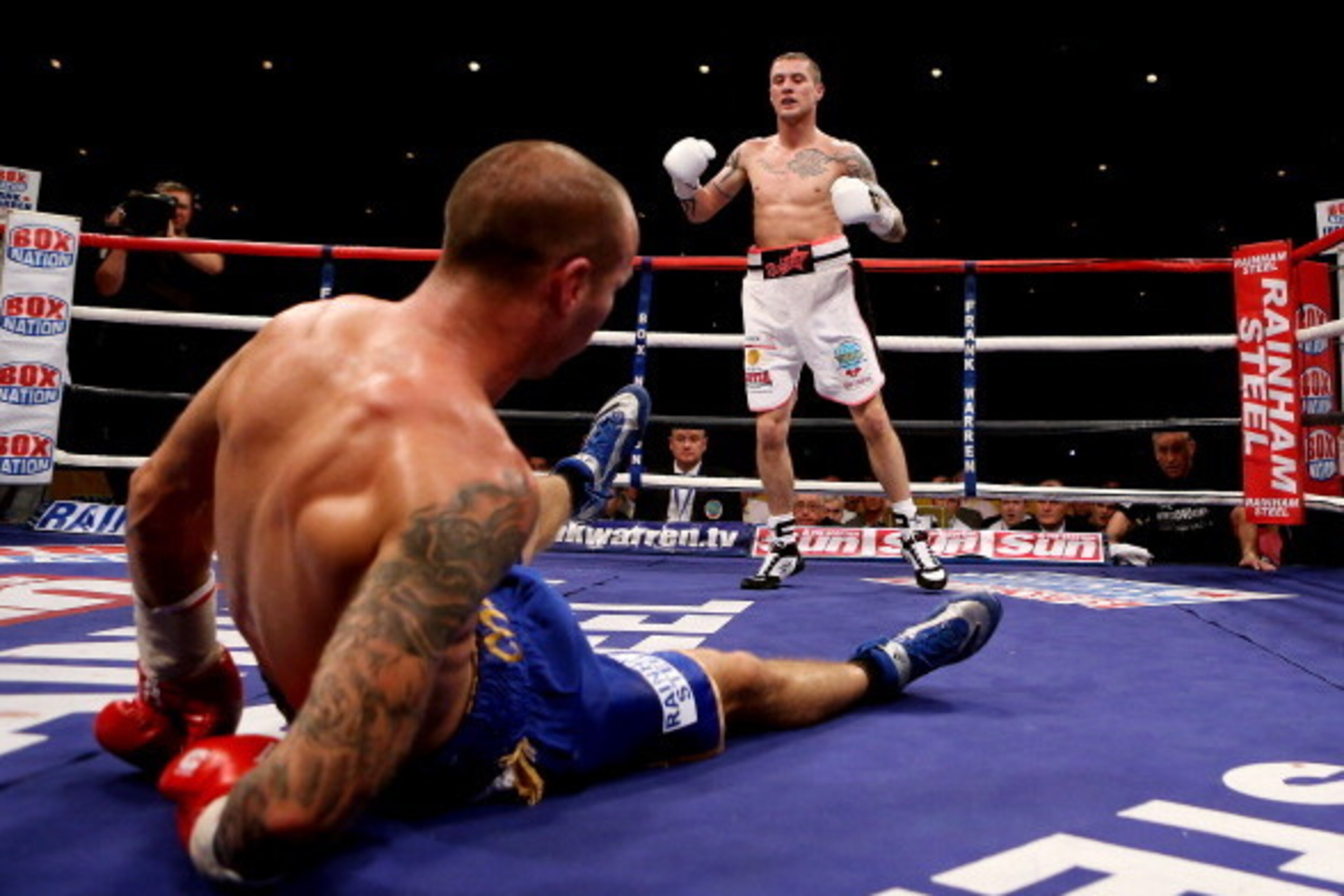 GLASGOW, SCOTLAND - SEPTEMBER 22: Ricky Burns knocks down Kevin Mitchell during the WBO World Lightweight Championship match at SECC on September 22, 2012 in Glasgow, Scotland. (Photo by Scott Heavey/Getty Images) GLASGOW, SCOTLAND - SEPTEMBER 22: Ricky Burns knocks down Kevin Mitchell during the WBO World Lightweight Championship match at SECC on September 22, 2012 in Glasgow, Scotland. (Photo by Scott Heavey/Getty Images)