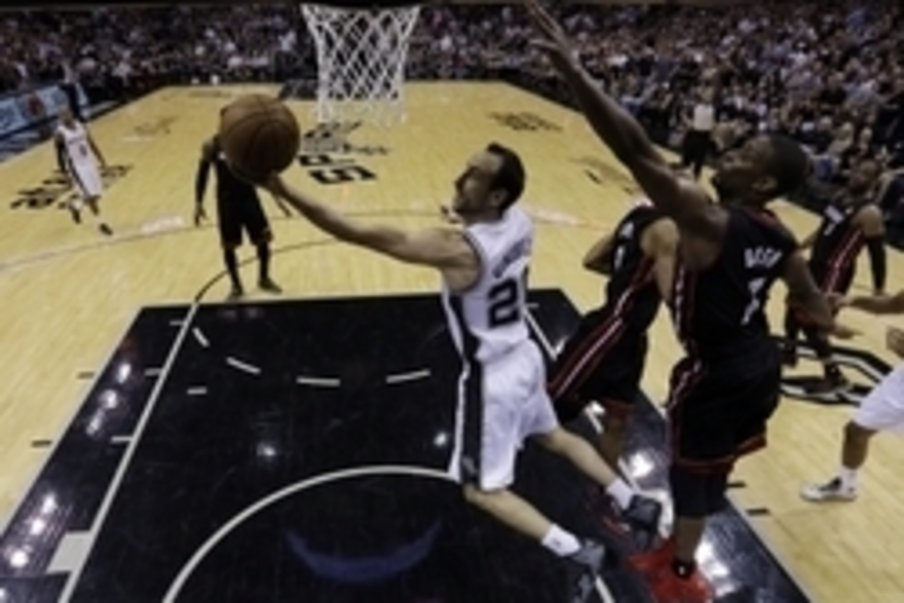June 15, 2014, San Antonio, TX, USA; San Antonio Spurs guard Manu Ginobili (20) shoots the ball against Miami Heat center Chris Bosh (1) in game five of the 2014 NBA Finals at the AT&T Center. Mandatory Credit: David J. Phillip/Pool Photo via USA TODAY Sp
