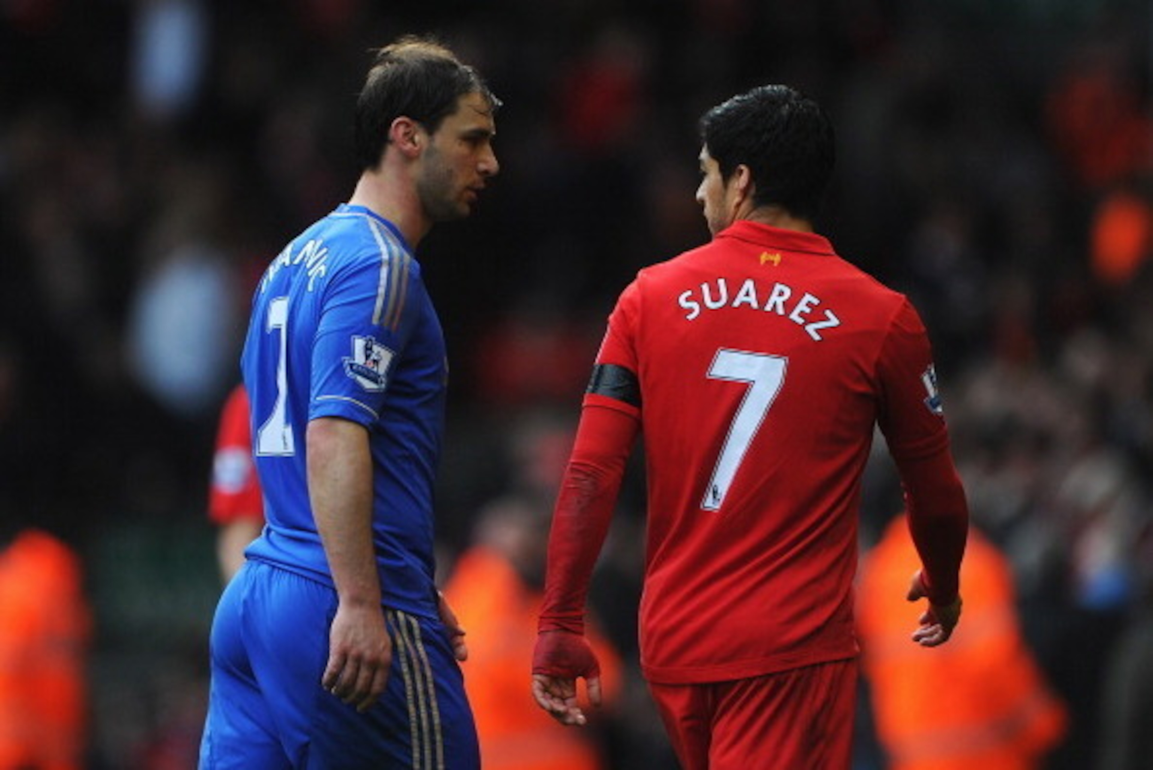LIVERPOOL, ENGLAND - APRIL 21: Branislav Ivanovic of Chelsea talks with Luis Suarez of Liverpool as they walk in for half time during the Barclays Premier League match between Liverpool and Chelsea at Anfield on April 21, 2013 in Liverpool, England. (Ph LIVERPOOL, ENGLAND - APRIL 21: Branislav Ivanovic of Chelsea talks with Luis Suarez of Liverpool as they walk in for half time during the Barclays Premier League match between Liverpool and Chelsea at Anfield on April 21, 2013 in Liverpool, England. (Ph