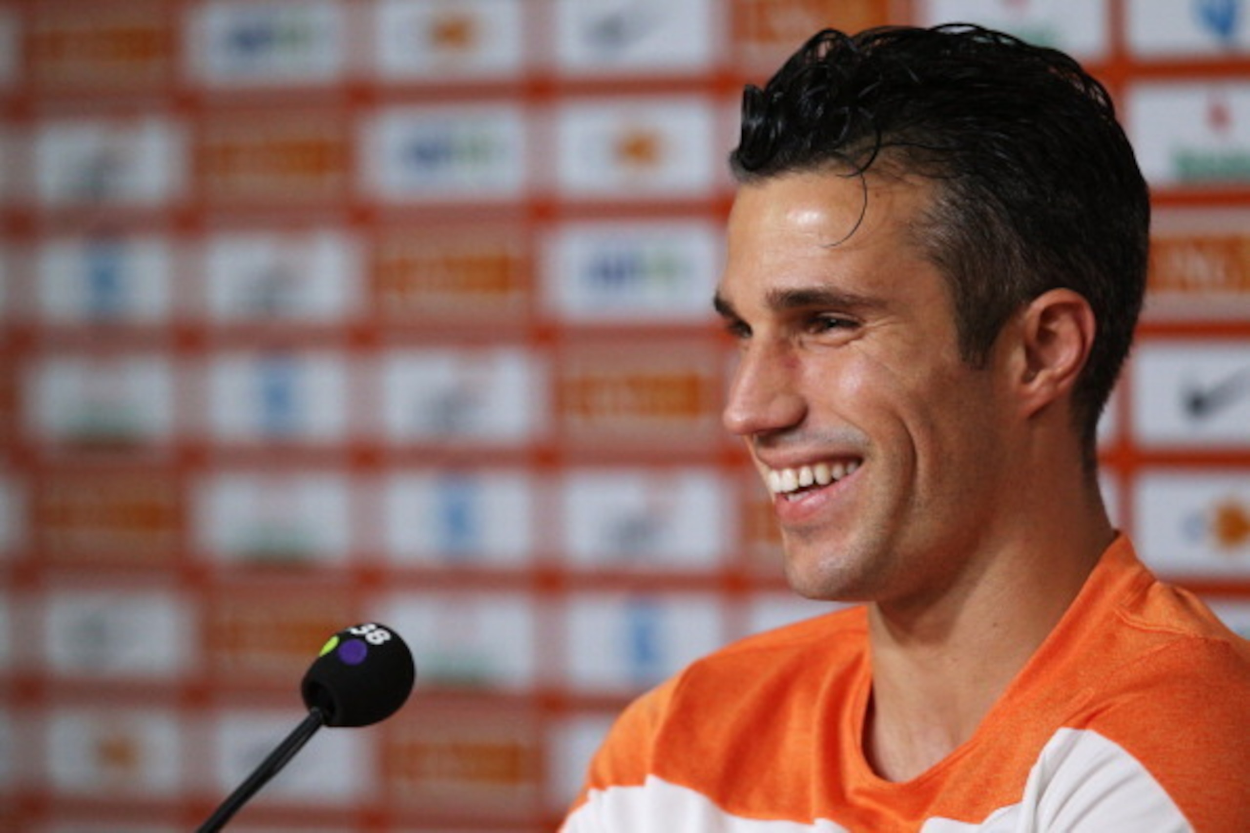 RIO DE JANEIRO, BRAZIL - JUNE 20:  Robin van Persie speaks to the media during the Netherlands Press Conference at the 2014 FIFA World Cup Brazil held at the Estadio Jose Bastos Padilha Gavea on June 20, 2014 in Rio de Janeiro, Brazil.  (Photo by Dean Mou