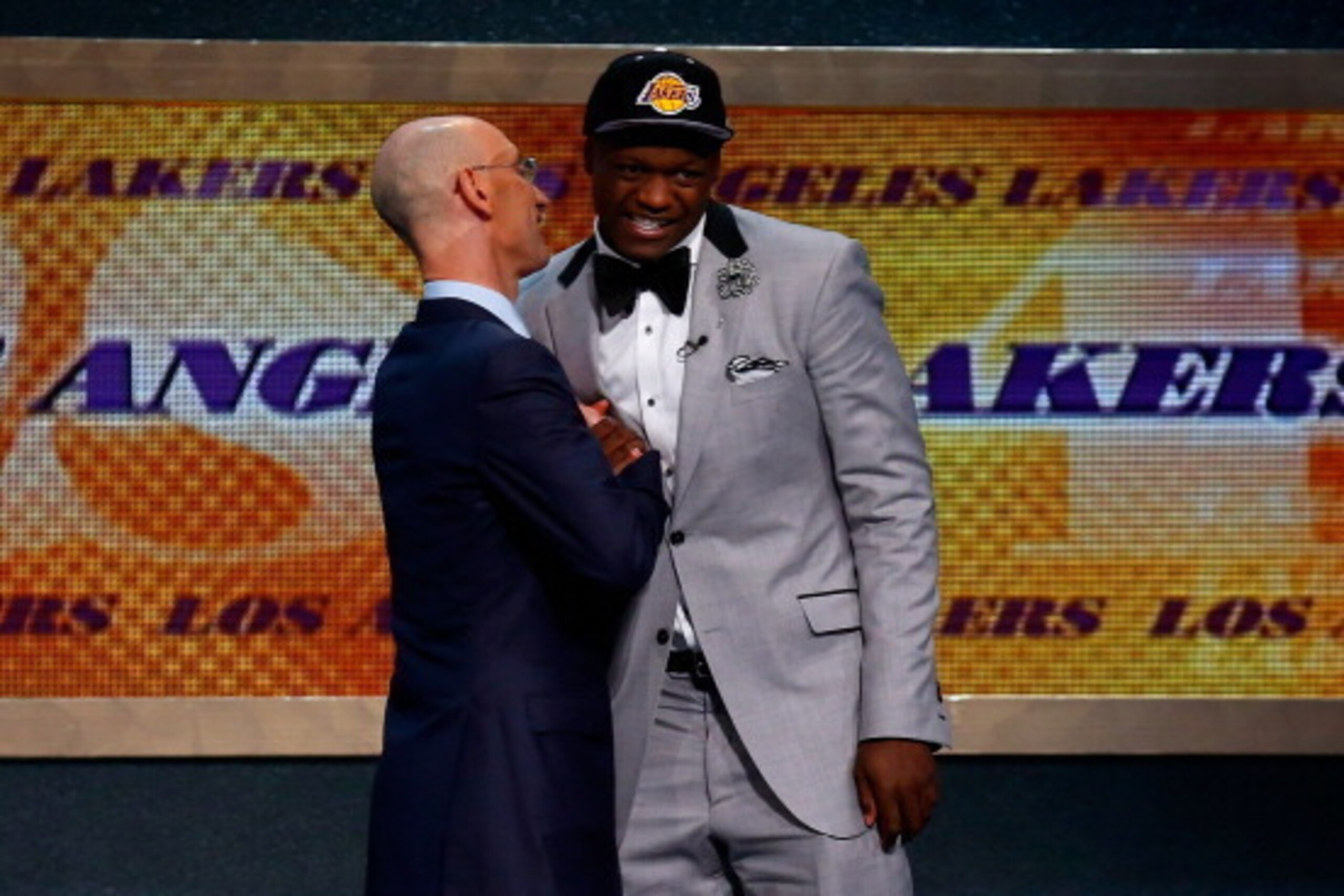 NEW YORK, NY - JUNE 26:  Julius Randle (R) of Kentucky shakes hands NBA Commissioner Adam Silver after being selected with the #7 overall pick by the Los Angeles Lakers during the 2014 NBA Draft at Barclays Center on June 26, 2014 in the Brooklyn borough 