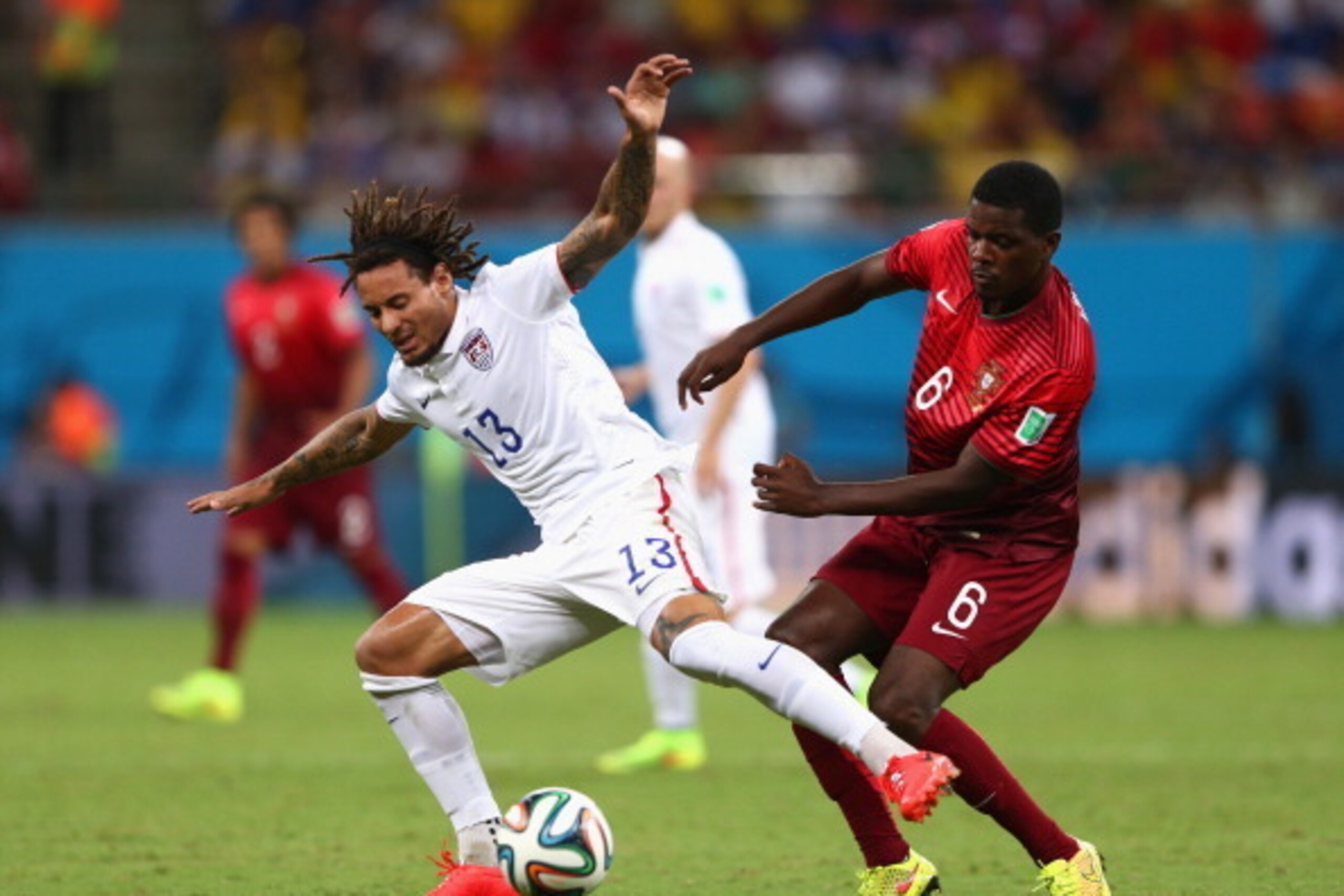 MANAUS, BRAZIL - JUNE 22: Jermaine Jones of the United States is challenged by William Carvalho of Portugal during the 2014 FIFA World Cup Brazil Group G match between the United States and Portugal at Arena Amazonia on June 22, 2014 in Manaus, Brazil.  (