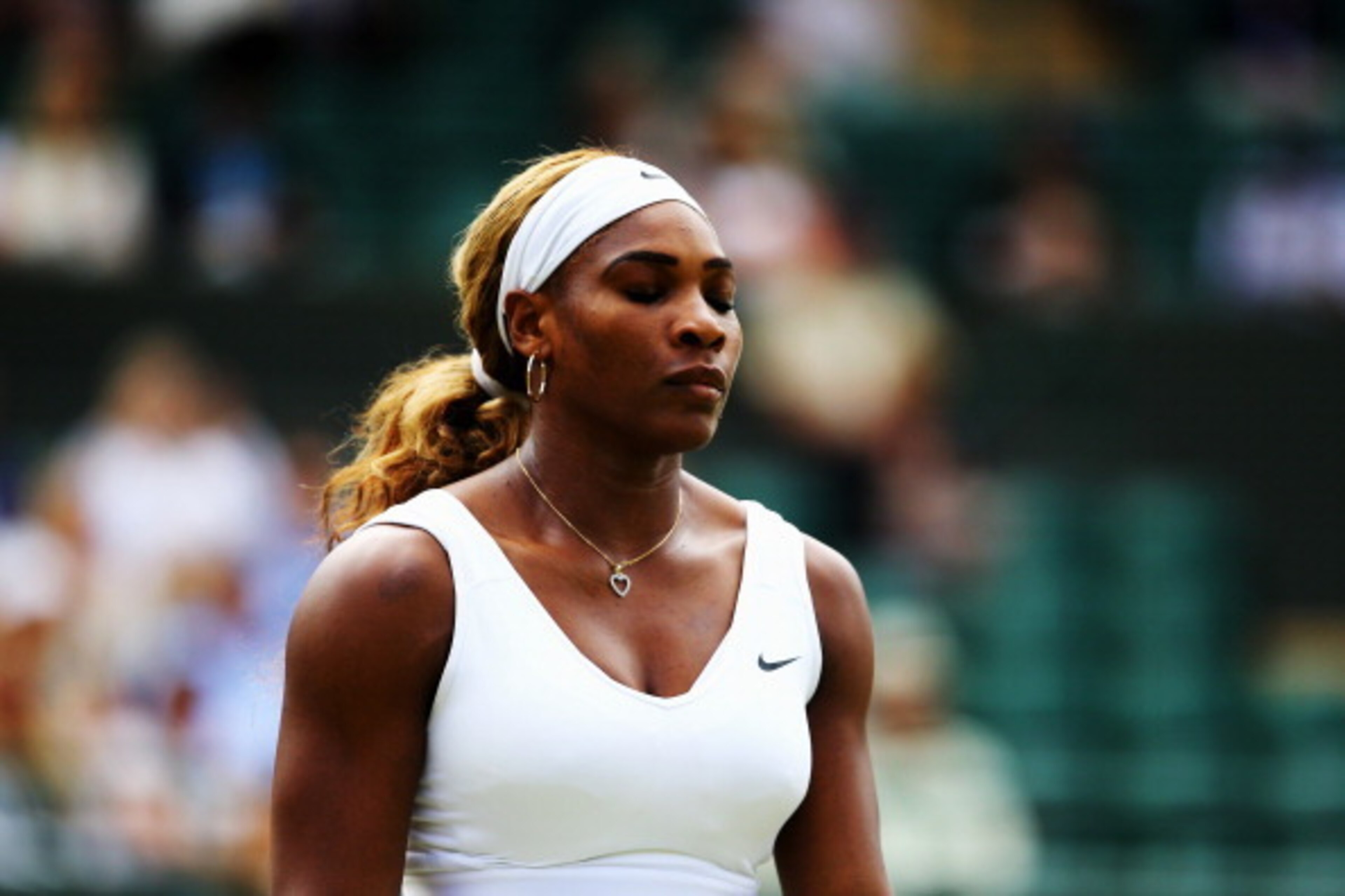 LONDON, ENGLAND - JUNE 26:  Serena Williams of the United States in action during her Ladies' Singles second round match against Chanelle Scheepers of South Africa on day four of the Wimbledon Lawn Tennis Championships at the All England Lawn Tennis and C