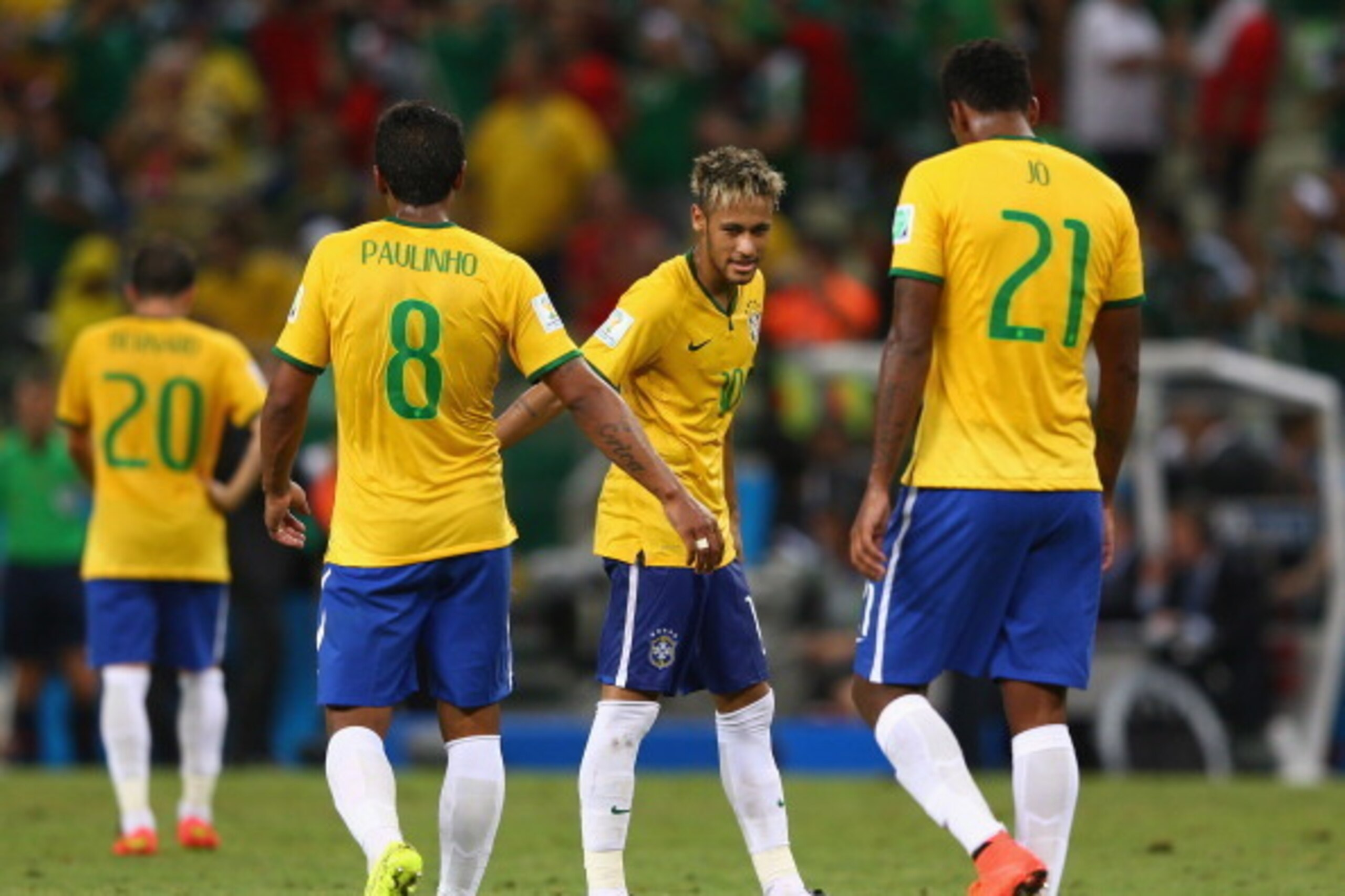 FORTALEZA, BRAZIL - JUNE 17:  Neymar of Brazil, Paulinho abd Jo look dejected after a 0-0 draw in the 2014 FIFA World Cup Brazil Group A match between Brazil and Mexico at Castelao on June 17, 2014 in Fortaleza, Brazil.  (Photo by Michael Steele/Getty Ima