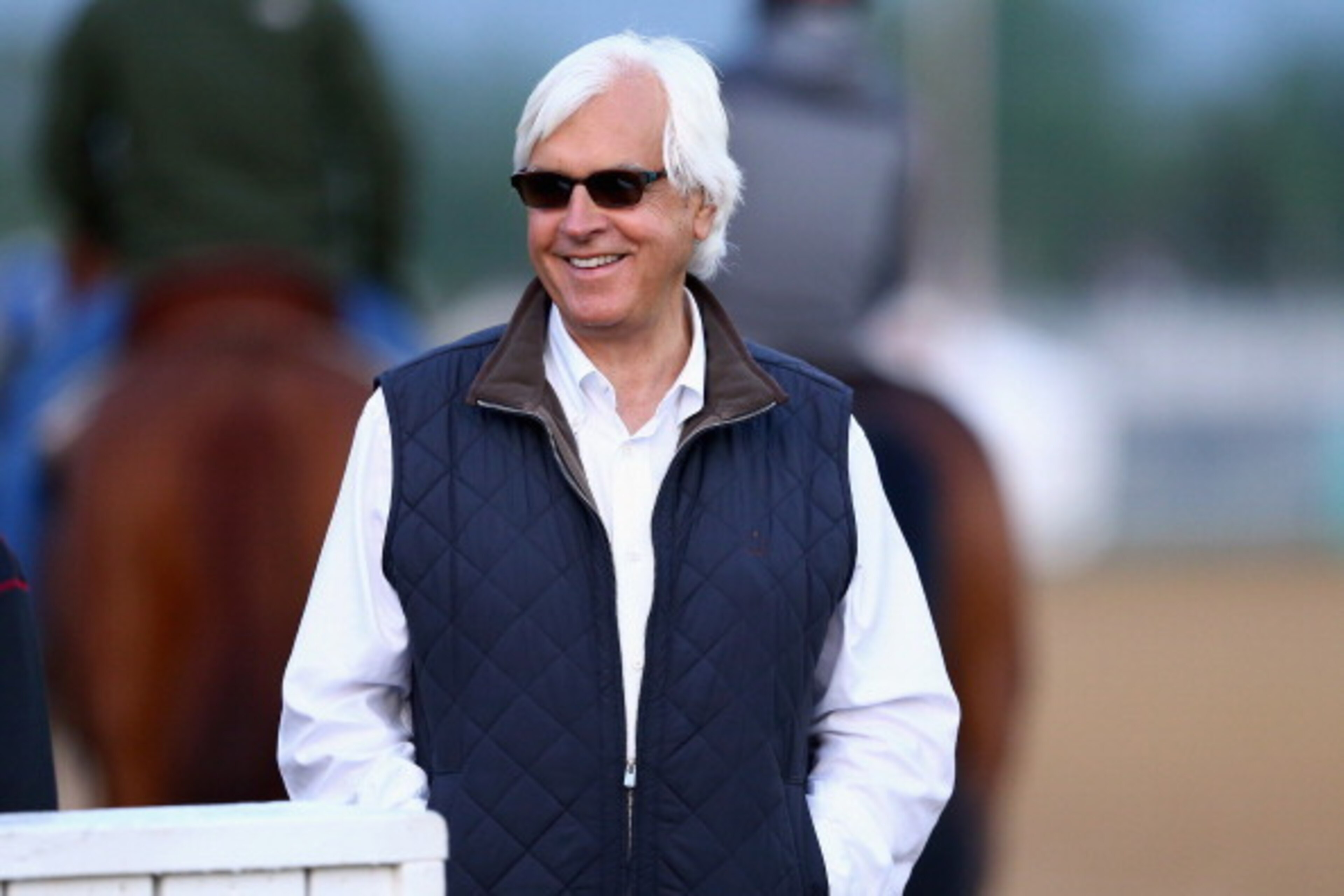 LOUISVILLE, KY - APRIL 30:  Bob Baffert the trainer of Chitu and Hoppertunity watches during the morning training for the Kentucky Derby at Churchill Downs on April 30, 2014 in Louisville, Kentucky.  (Photo by Andy Lyons/Getty Images)