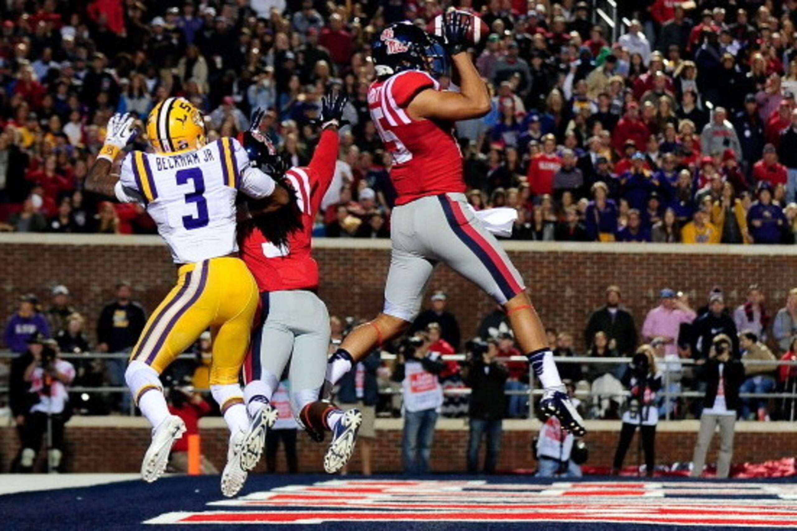 OXFORD, MS - OCTOBER 19:  Cody Prewitt #25 of the Ole Miss Rebels intercepts a pass intended for Odell Beckham Jr. #3 of the LSU Tigers during a game at Vaught-Hemingway Stadium on October 19, 2013 in Oxford, Mississippi.  (Photo by Stacy Revere/Getty Ima