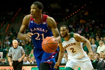 WACO, TX - FEBRUARY 04: Joel Embiid #21 of the Kansas Jayhawks drives to the basket against the Baylor Bears on February 4, 2014 at the Ferrell Center in Waco, Texas.  (Photo by Cooper Neill/Getty Images)
