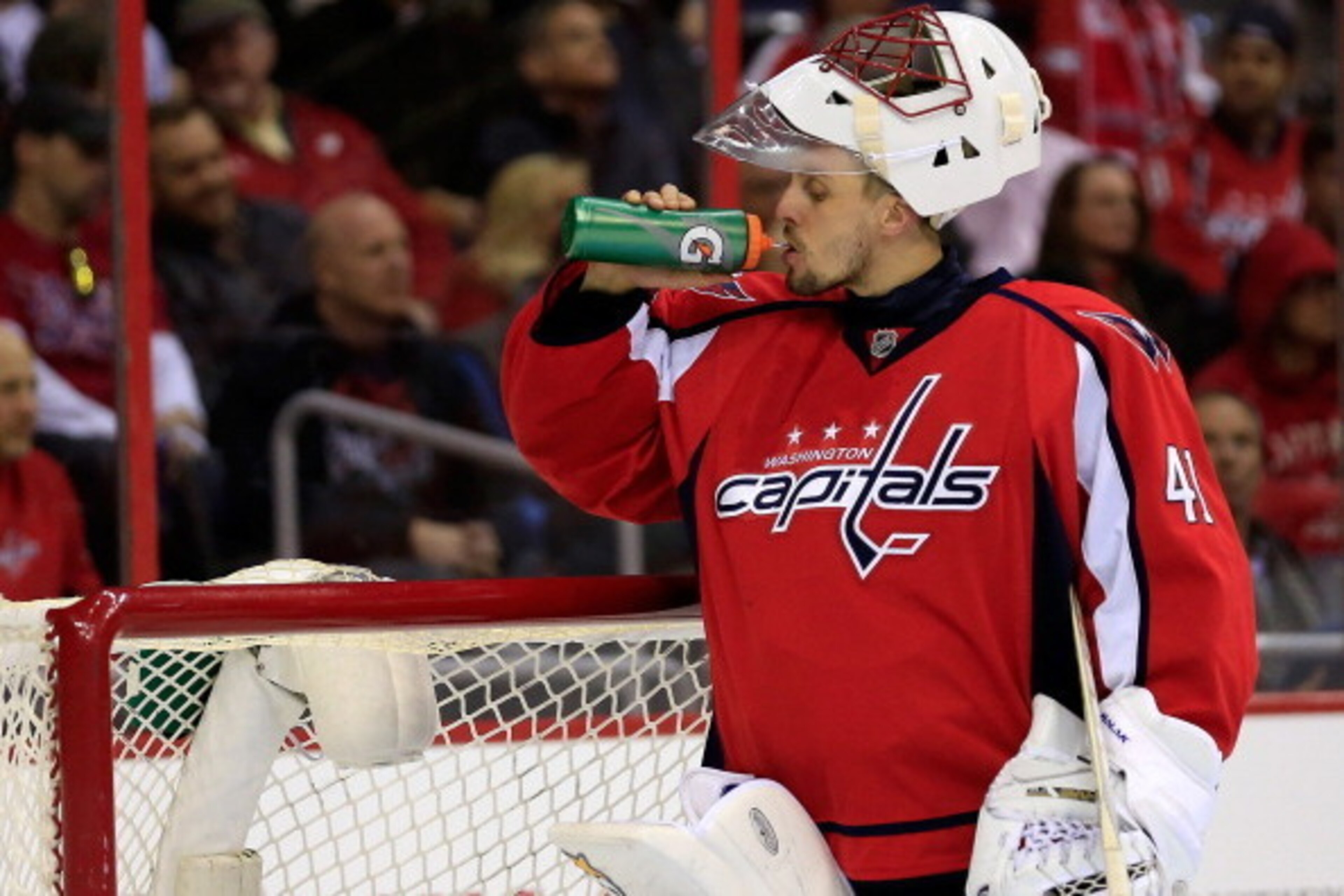 WASHINGTON, DC - MARCH 10: Goalie Jaroslav Halak #41 of the Washington Capitals gets a drink during the second period of the Capitals 3-2 loss to the Pittsburgh Penguins at Verizon Center on March 10, 2014 in Washington, DC.  (Photo by Rob Carr/Getty Imag