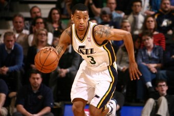 SALT LAKE CITY, UT - APRIL 04:  Trey Burke #3 of the Utah Jazz handles the ball against the New Orleans Pelicans at EnergySolutions Arena on April 04, 2014 in Salt Lake City, Utah. NOTE TO USER: User expressly acknowledges and agrees that, by downloading 
