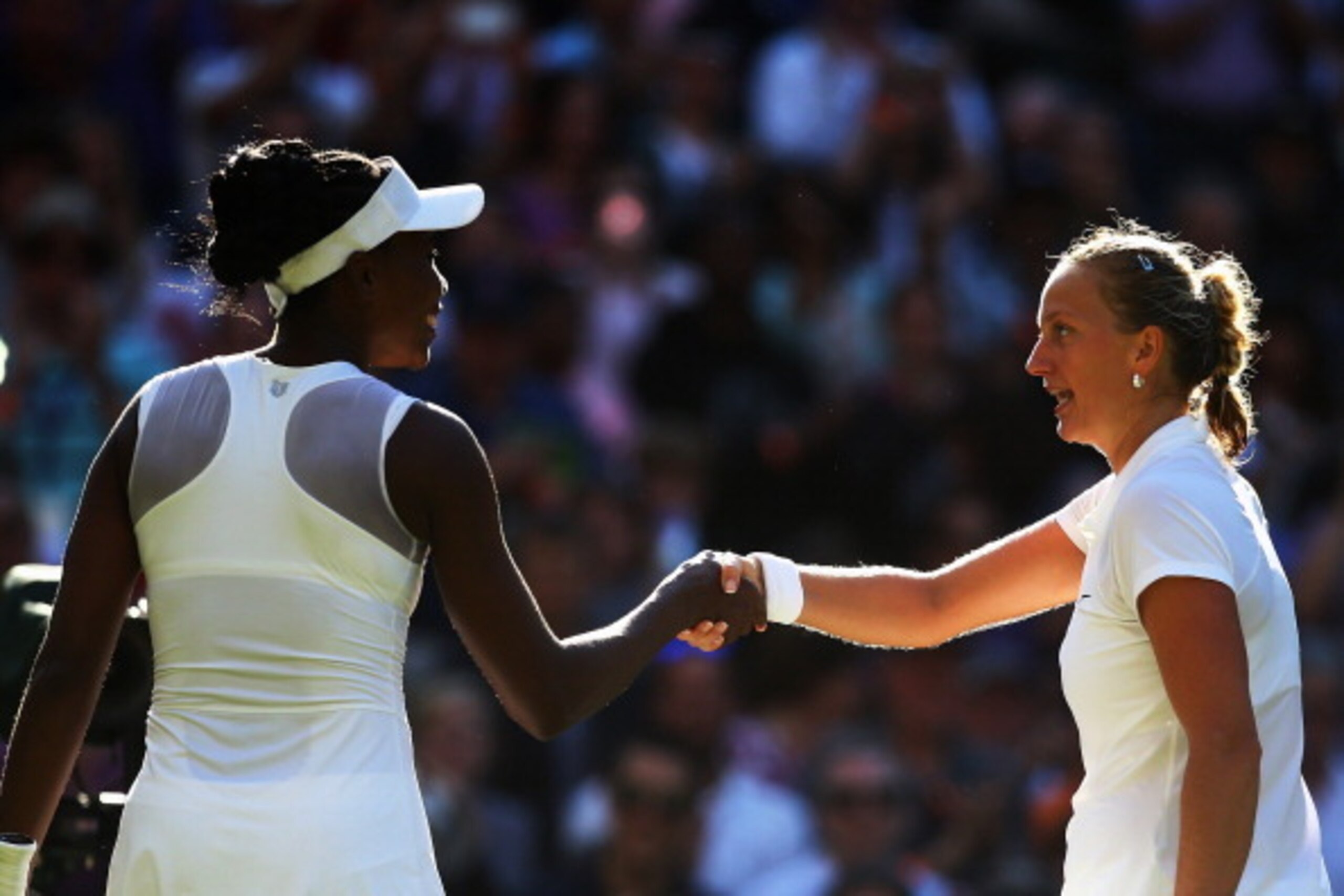 LONDON, ENGLAND - JUNE 27:  Venus Williams of the United States shakes hands with Petra Kvitova of Czech Republic after their Ladies' Singles third round match on day five of the Wimbledon Lawn Tennis Championships at the All England Lawn Tennis and Croqu
