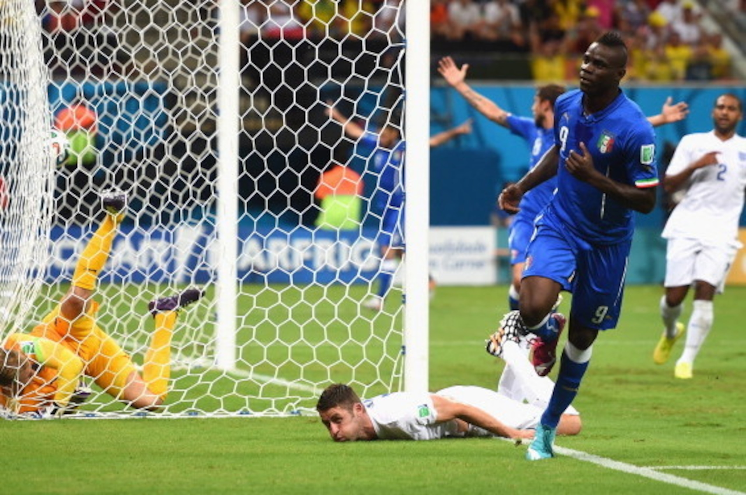 MANAUS, BRAZIL - JUNE 14:  Mario Balotelli of Italy celebrates after scoring the second goal during the 2014 FIFA World Cup Brazil Group D match between England and Italy at Arena Amazonia on June 14, 2014 in Manaus, Brazil.  (Photo by Christopher Lee/Get
