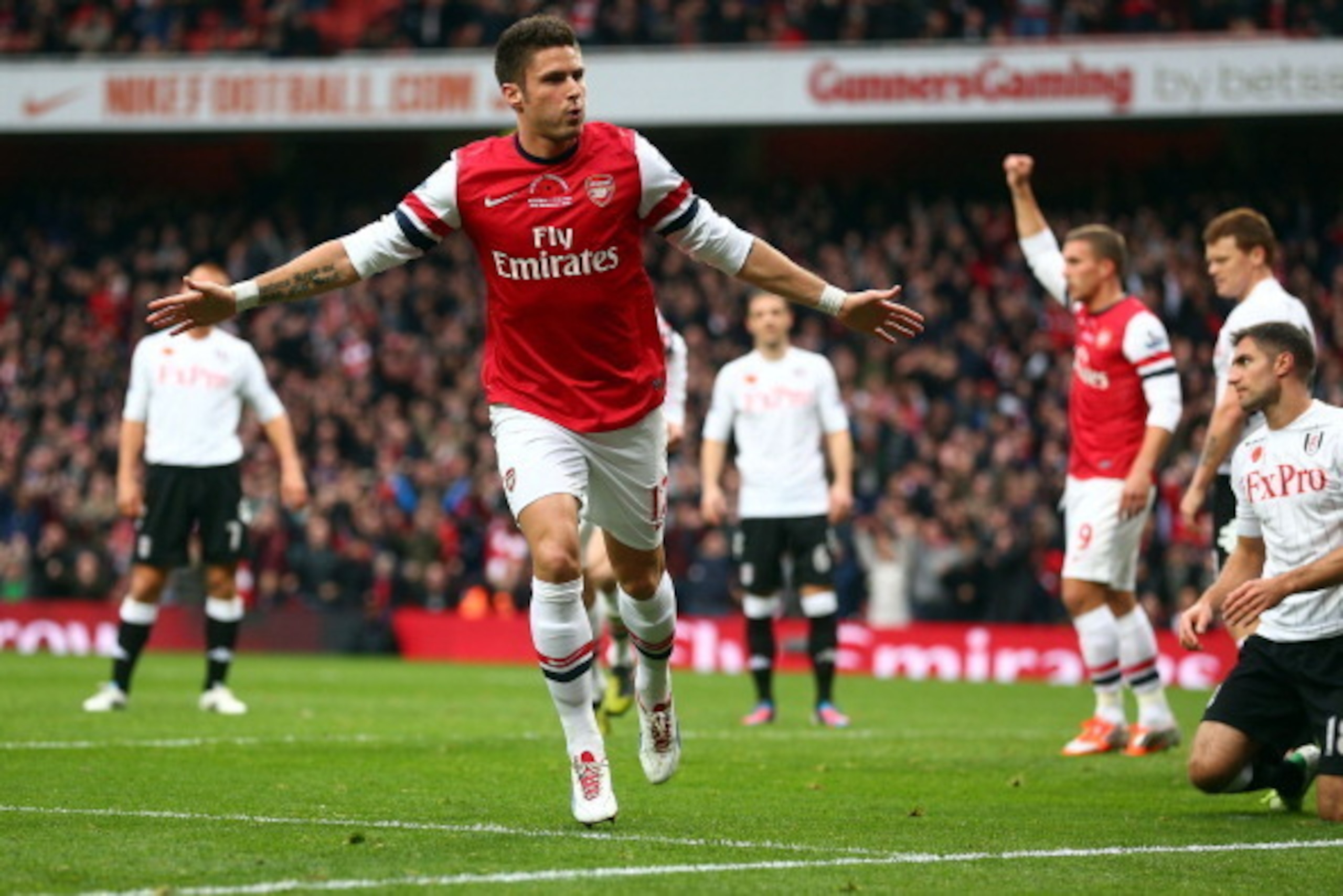 LONDON, ENGLAND - NOVEMBER 10:  Olivier Giroud of Arsenal celebrates his goal during the Barclays Premier League match between Arsenal and Fulham at Emirates Stadium on November 10, 2012 in London, England.  (Photo by Clive Rose/Getty Images,)