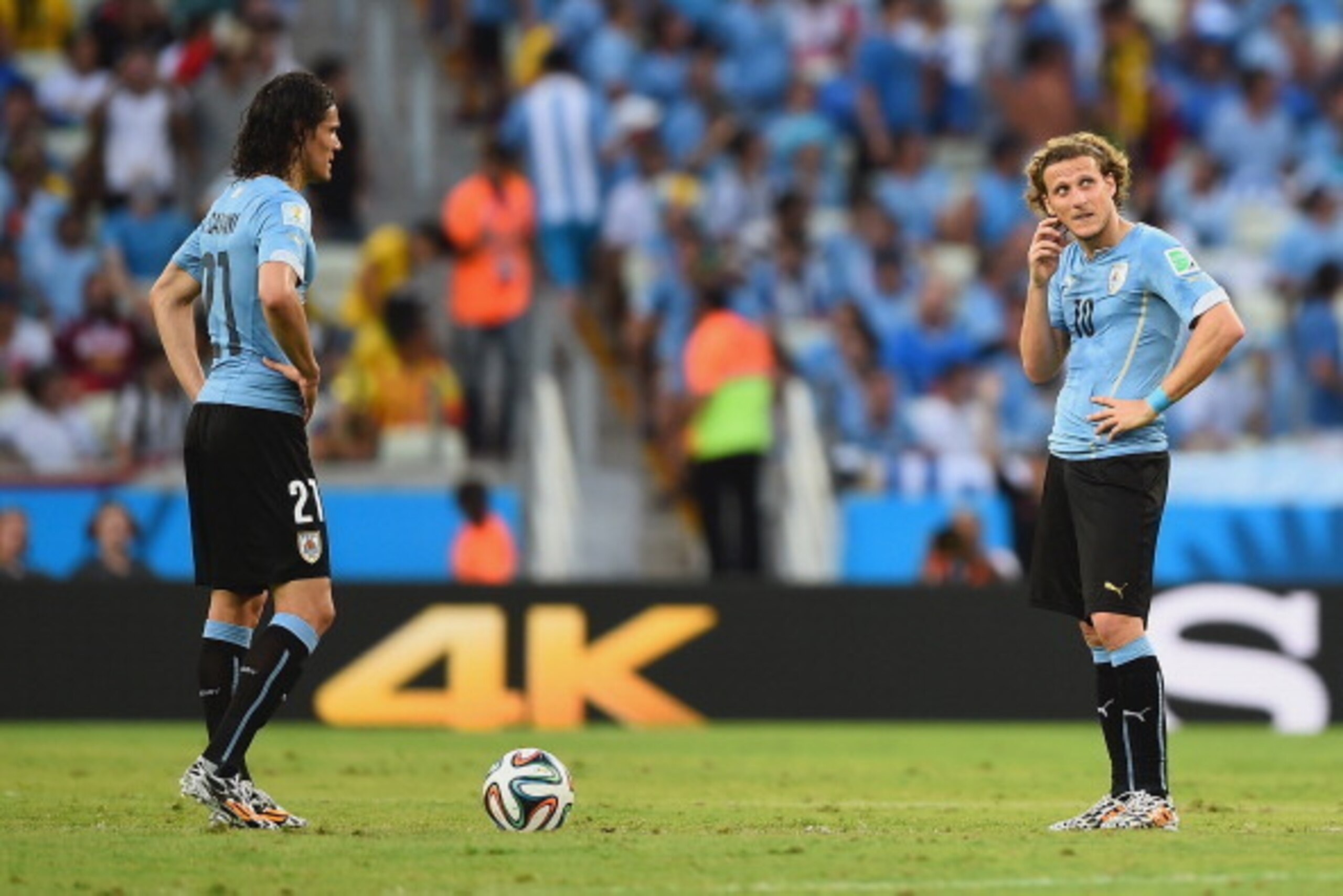 FORTALEZA, BRAZIL - JUNE 14:  Edinson Cavani (L) and Diego Forlan of Uruguay wait to kick off after allowing a goal during the 2014 FIFA World Cup Brazil Group D match between Uruguay and Costa Rica at Castelao on June 14, 2014 in Fortaleza, Brazil.  (Pho