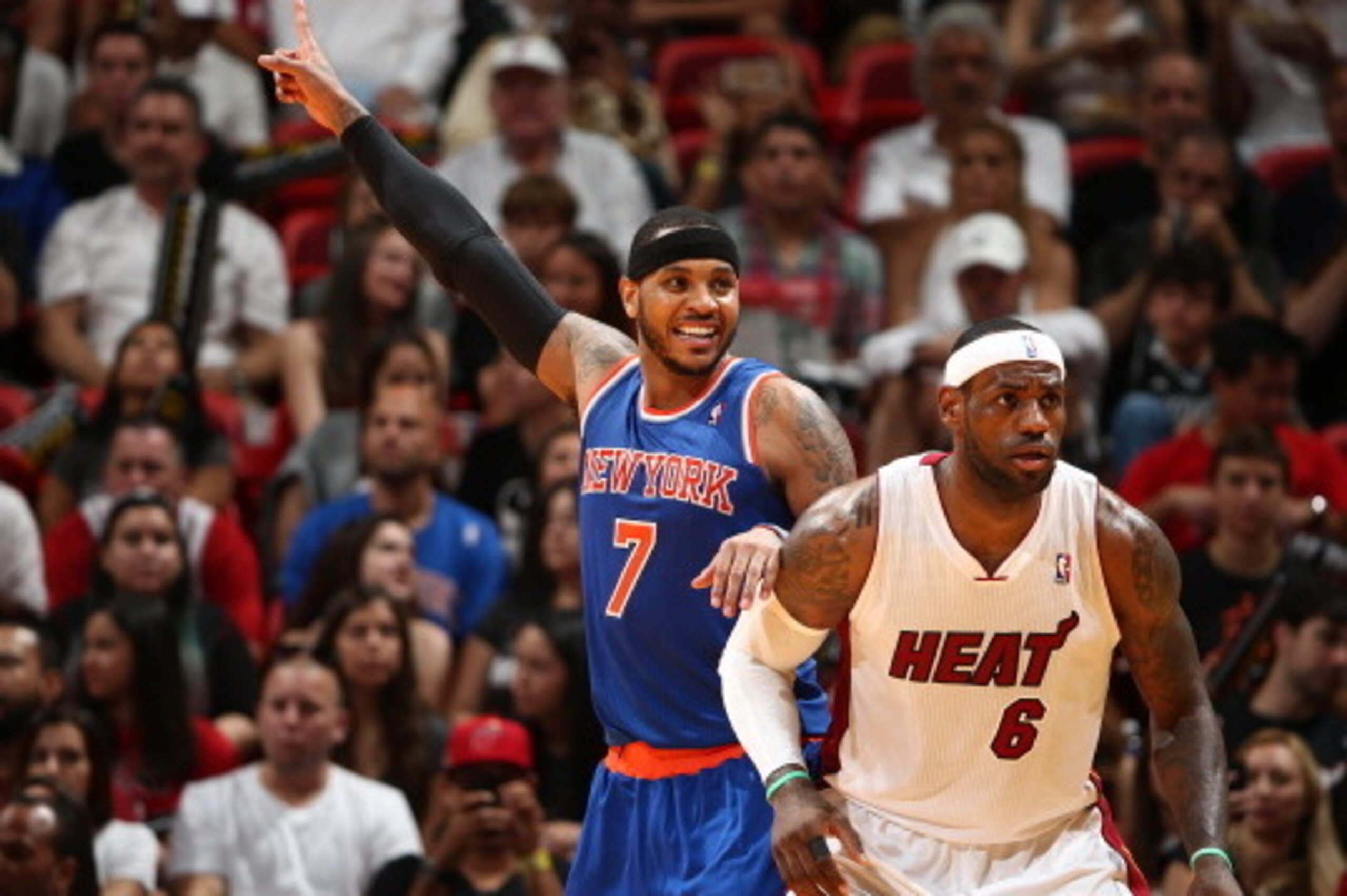 MIAMI, FL - APRIL 6: LeBron James #6 of the Miami Heat defends Carmelo Anthony #7 of the New York Knicks as he calls for the ball during a game on April 6, 2014 at American Airlines Arena in Miami, Florida.  NOTE TO USER: User expressly acknowledges and a