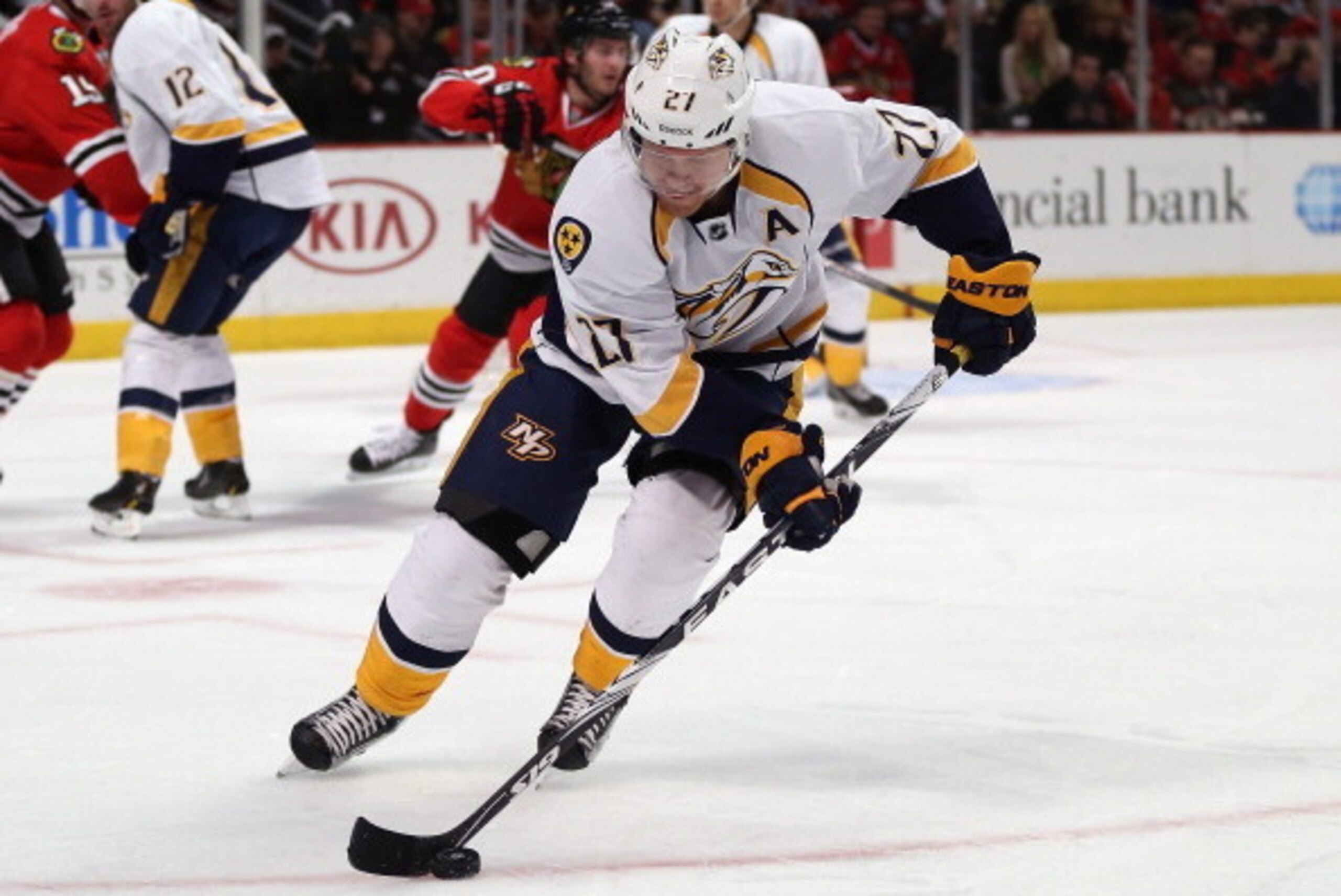CHICAGO, IL - MARCH 14:  Patric Hornqvist #27 of the Nashville Predators controls the puck against the Chicago Blackhawks at the United Center on March 14, 2014  in Chicago, Illinois.  (Photo by Jonathan Daniel/Getty Images)