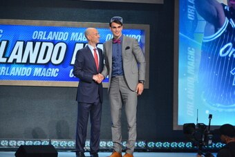 BROOKLYN, NY - JUNE 26: Dario Saric shakes hands with NBA Commissioner Adam Silver after being selected number twelve overall by the Orlando Magic during the 2014 NBA Draft on June 26, 2014 at Barclays Center in Brooklyn, New York. NOTE TO USER: User expr
